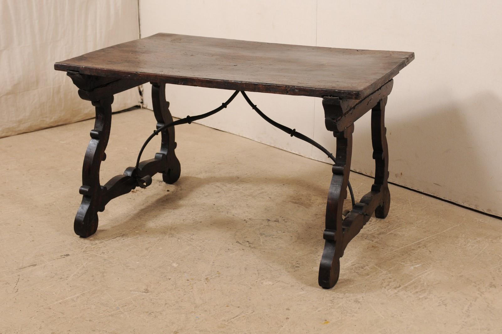 An 18th Century Walnut Wood Trestle Table with Arched Iron Stretcher from Italy In Good Condition In Atlanta, GA