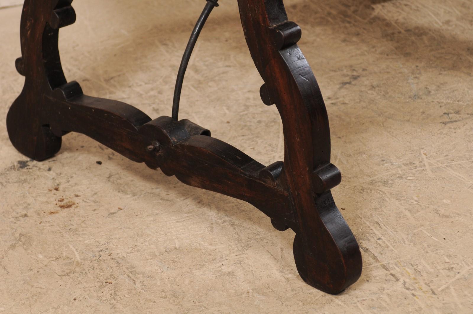 18th Century and Earlier An 18th Century Walnut Wood Trestle Table with Arched Iron Stretcher from Italy