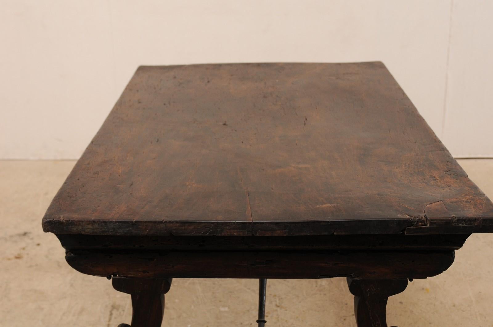 An 18th Century Walnut Wood Trestle Table with Arched Iron Stretcher from Italy 4