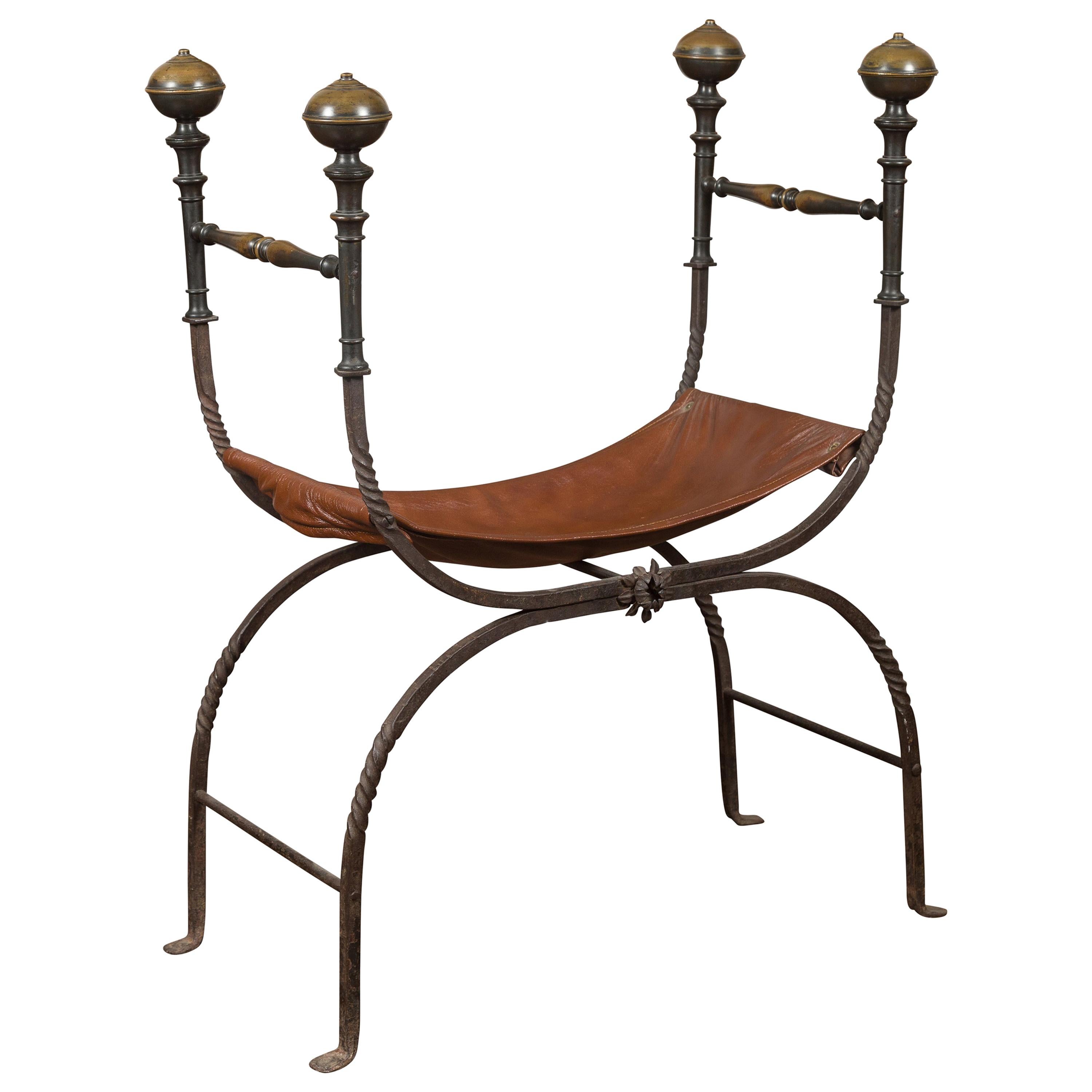 Italian 1900s Leather Seat Iron Folding Curule Stool with Toupie Finials For Sale