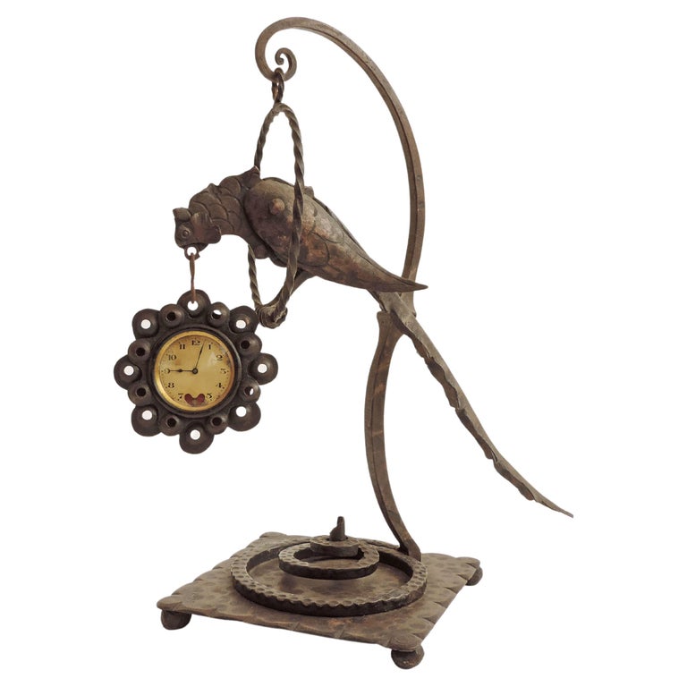 Italian 1920s Art Deco Wrought Iron Bird Holding a Clock For Sale