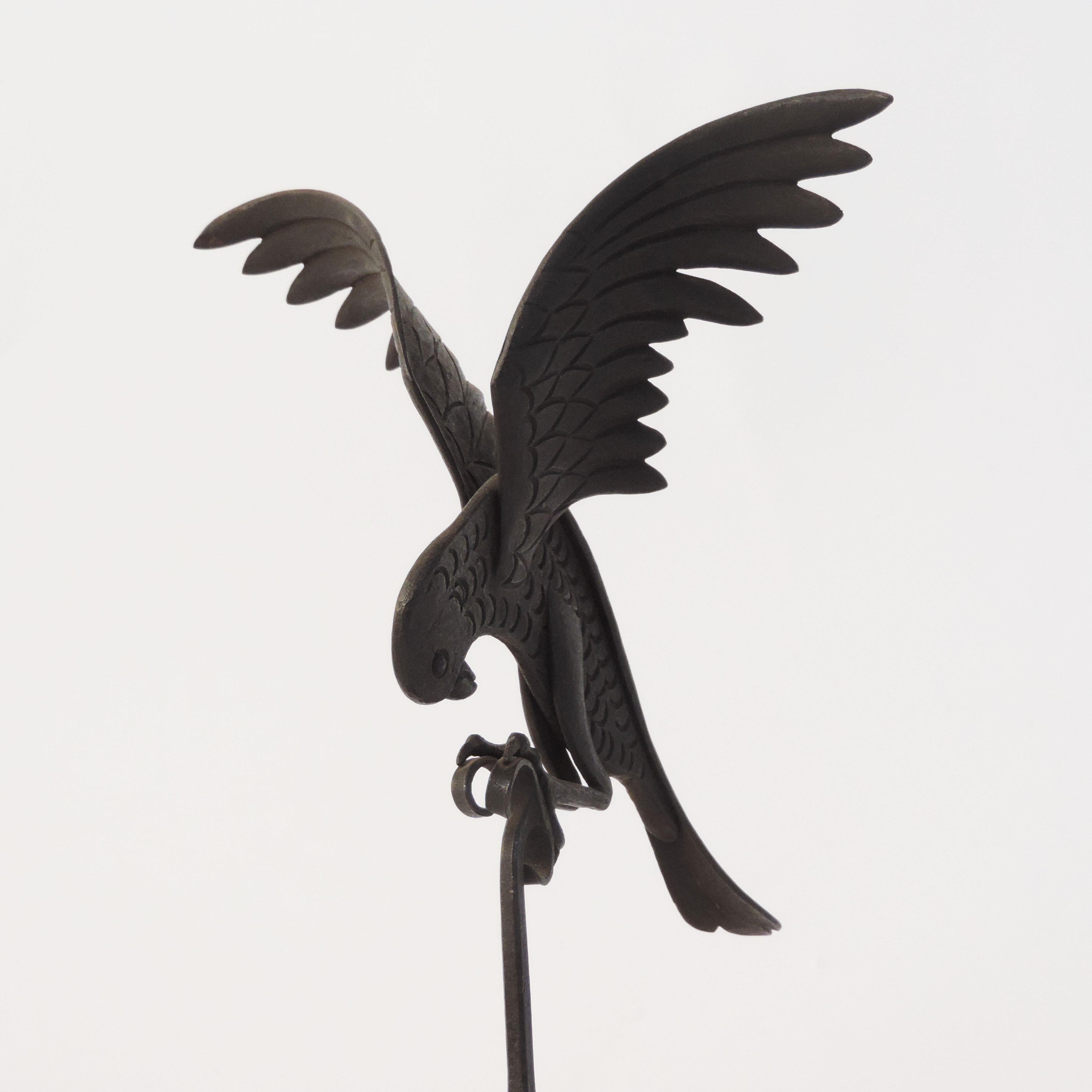 Italian 1920s Art Deco wrought iron parrot on a marble base.