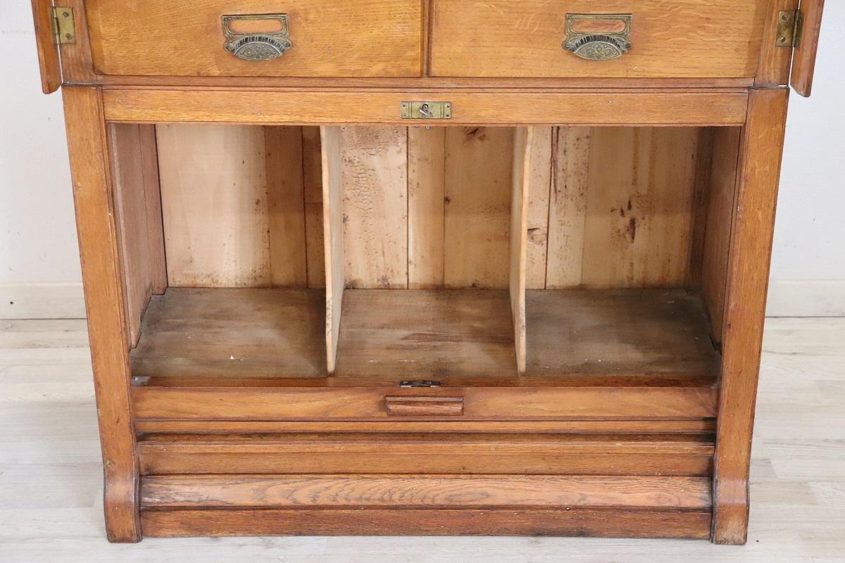 Italian 1920s Oak Wood Apothecary / Filing Cabinet, 18 Drawers and Shutter door For Sale 6