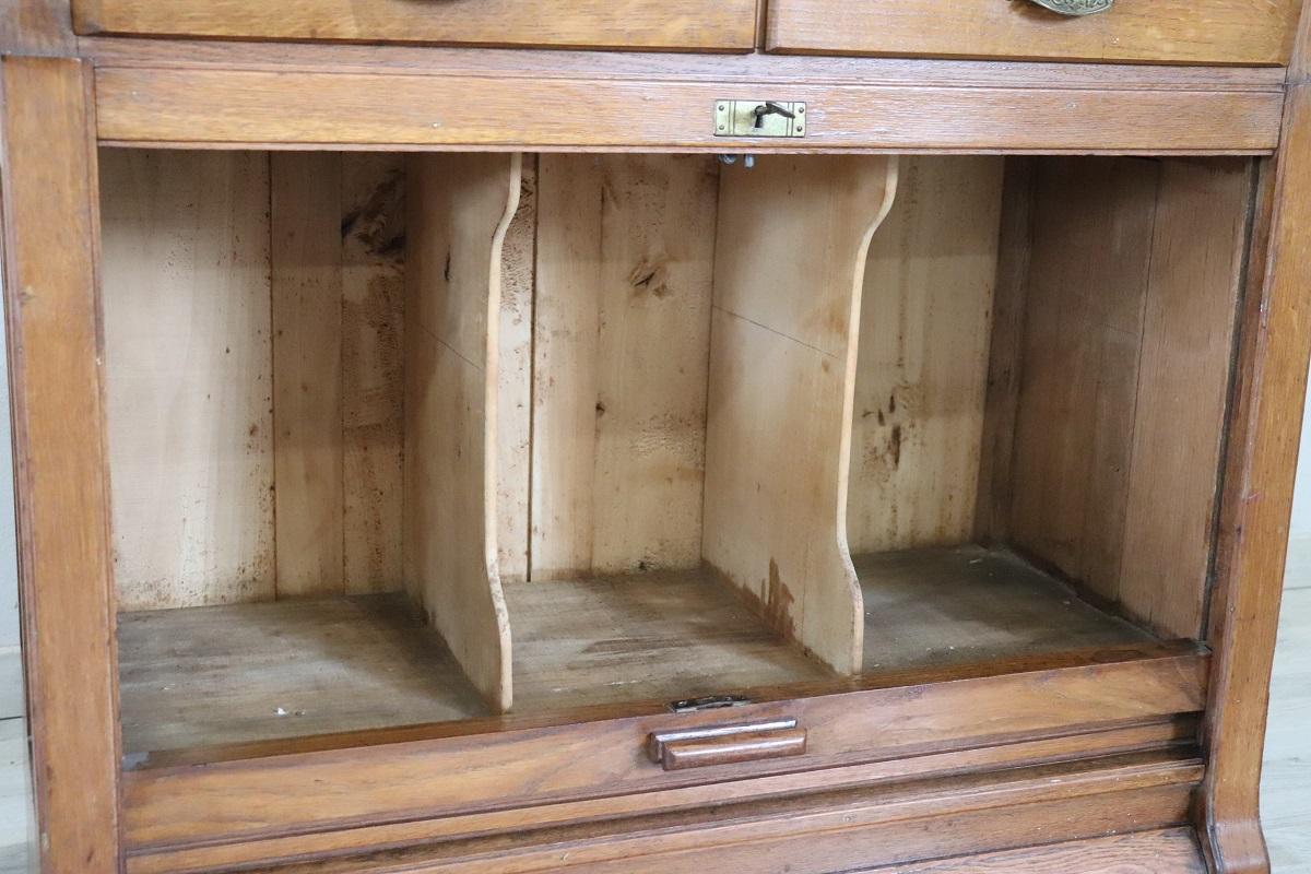 Italian 1920s Oak Wood Apothecary / Filing Cabinet, 18 Drawers and Shutter door For Sale 7