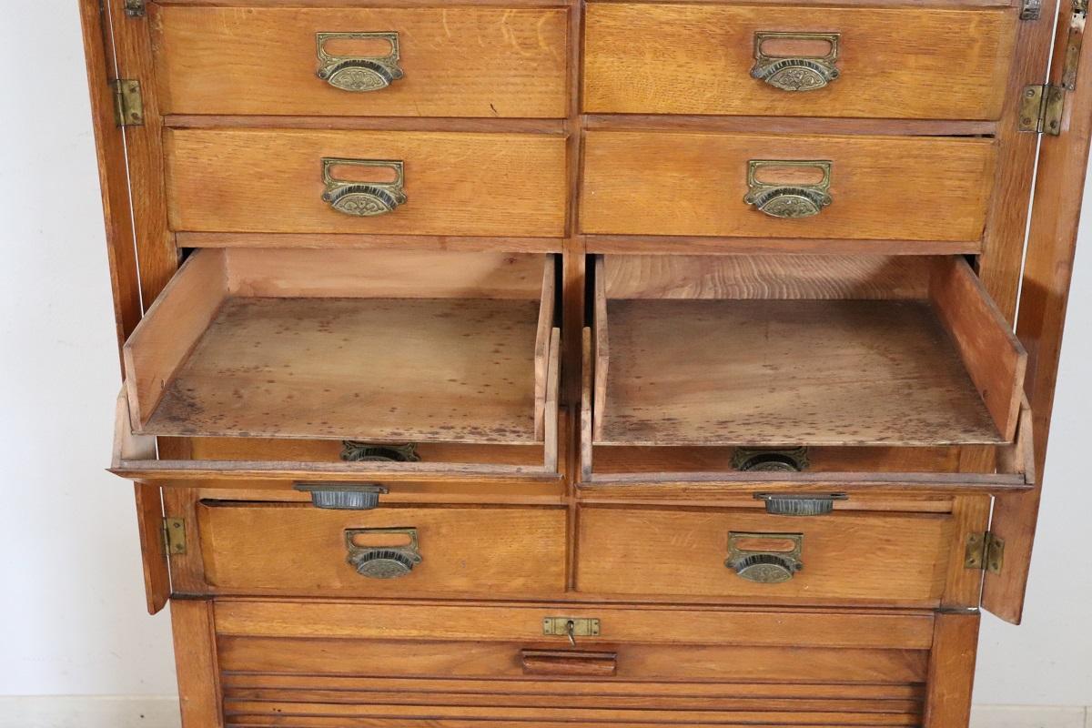 Italian 1920s Oak Wood Apothecary / Filing Cabinet, 18 Drawers and Shutter door For Sale 10