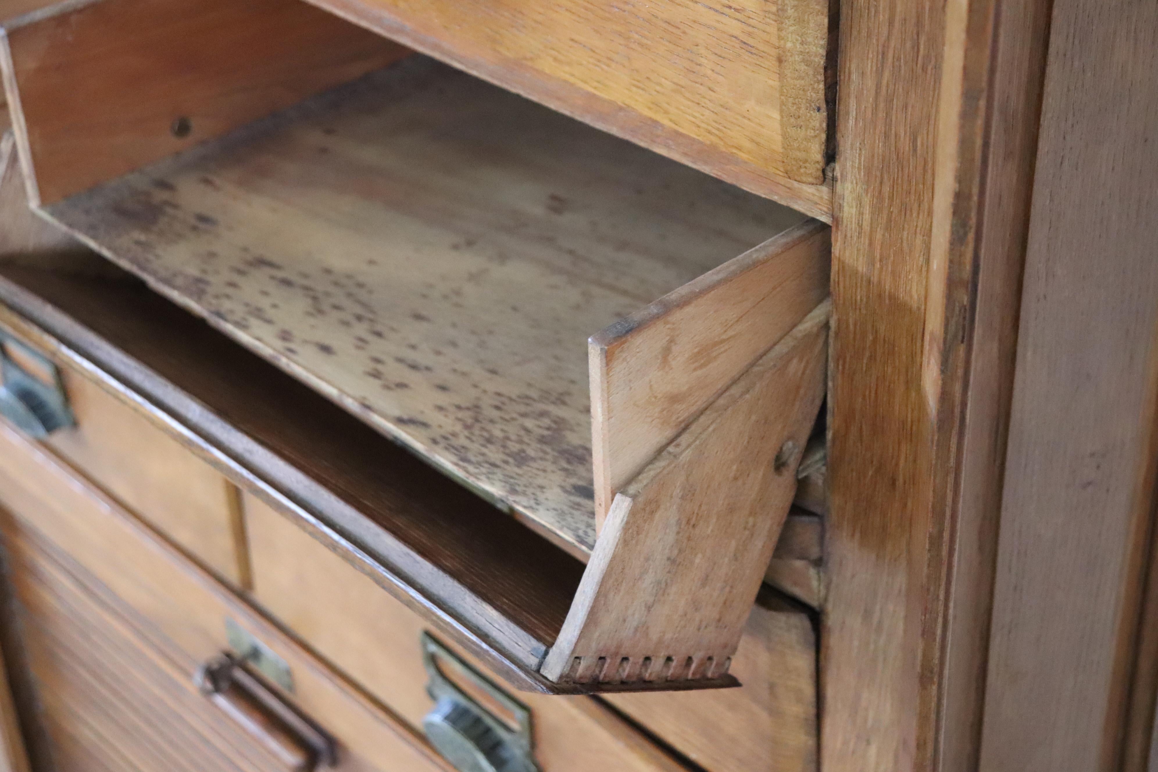 Italian 1920s Oak Wood Apothecary / Filing Cabinet, 18 Drawers and Shutter door For Sale 11