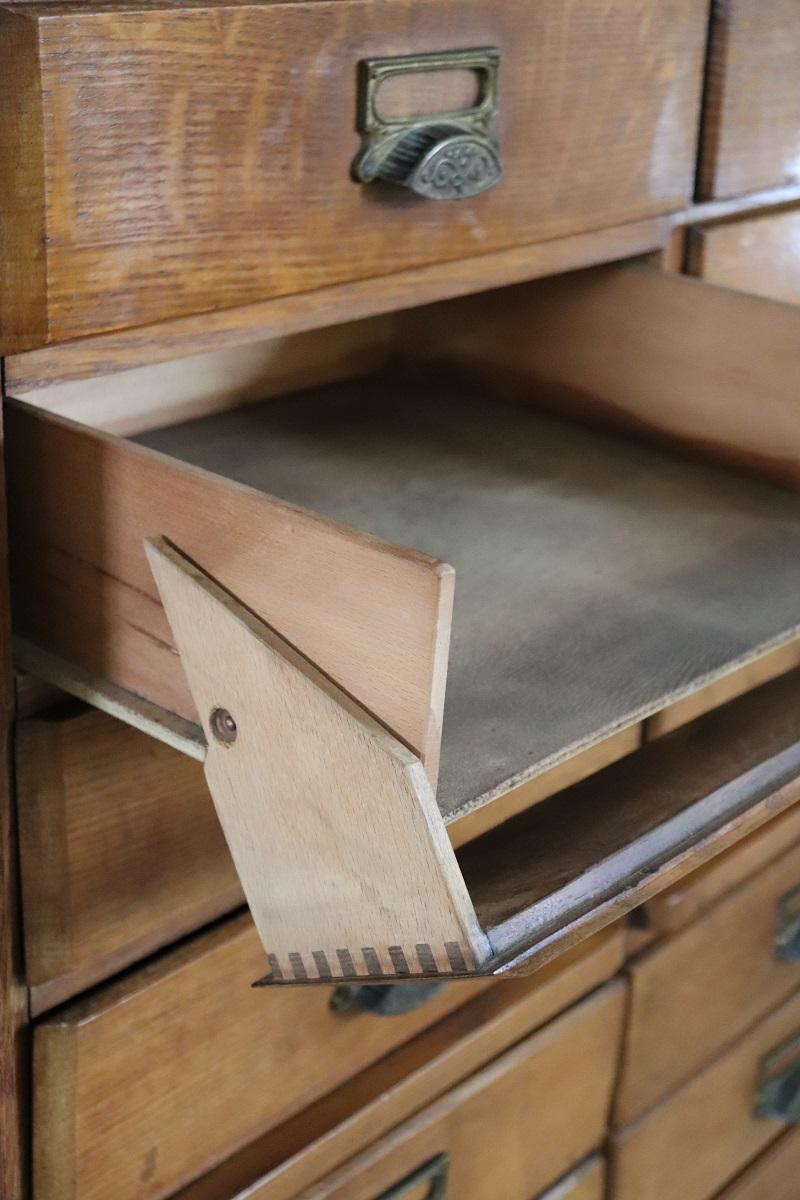 Italian 1920s Oak Wood Apothecary / Filing Cabinet, 18 Drawers and Shutter door For Sale 13