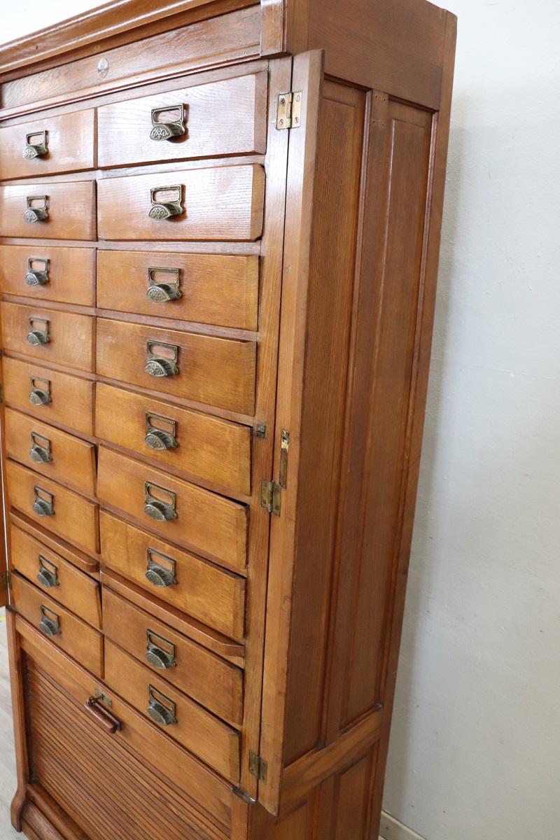 Italian 1920s Oak Wood Apothecary / Filing Cabinet, 18 Drawers and Shutter door For Sale 14
