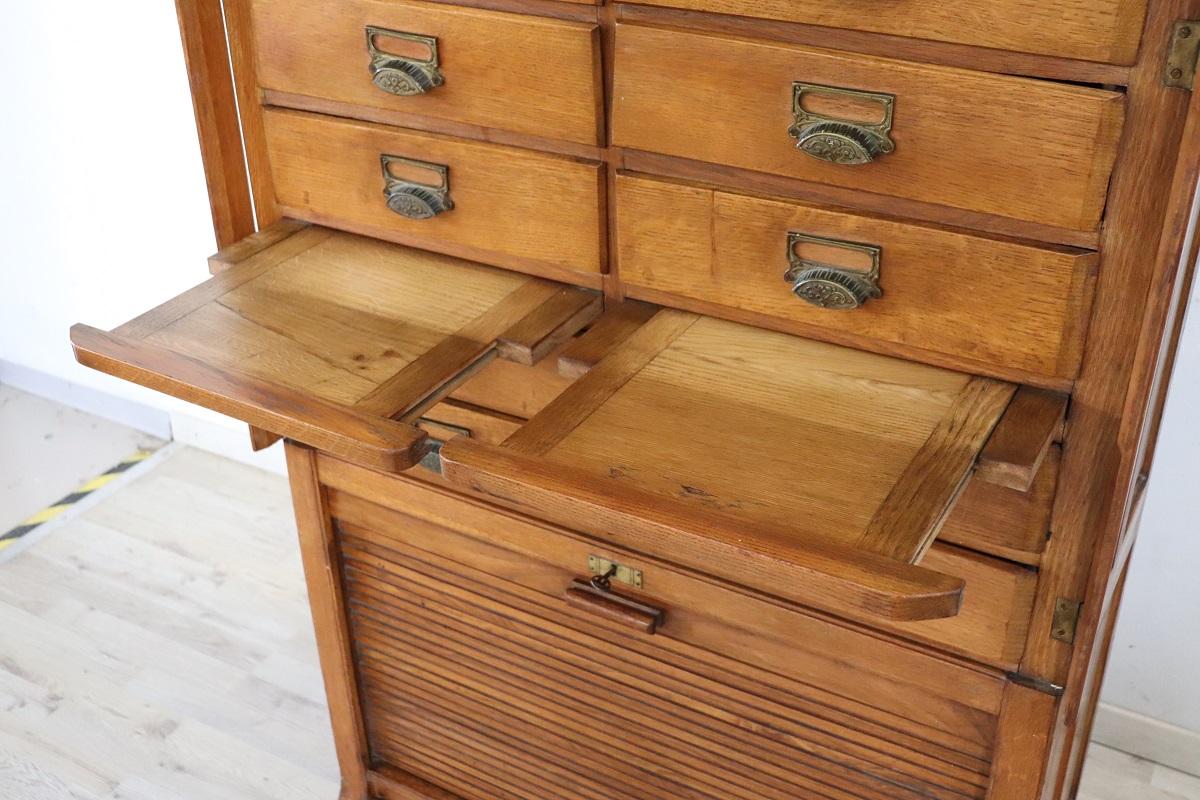 Italian 1920s Oak Wood Apothecary / Filing Cabinet, 18 Drawers and Shutter door In Good Condition For Sale In Casale Monferrato, IT