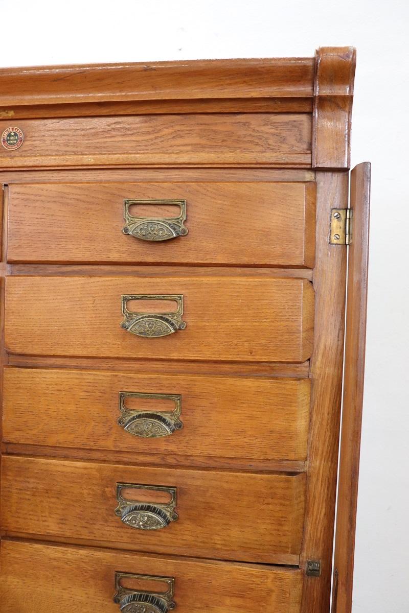 Italian 1920s Oak Wood Apothecary / Filing Cabinet, 18 Drawers and Shutter door For Sale 1