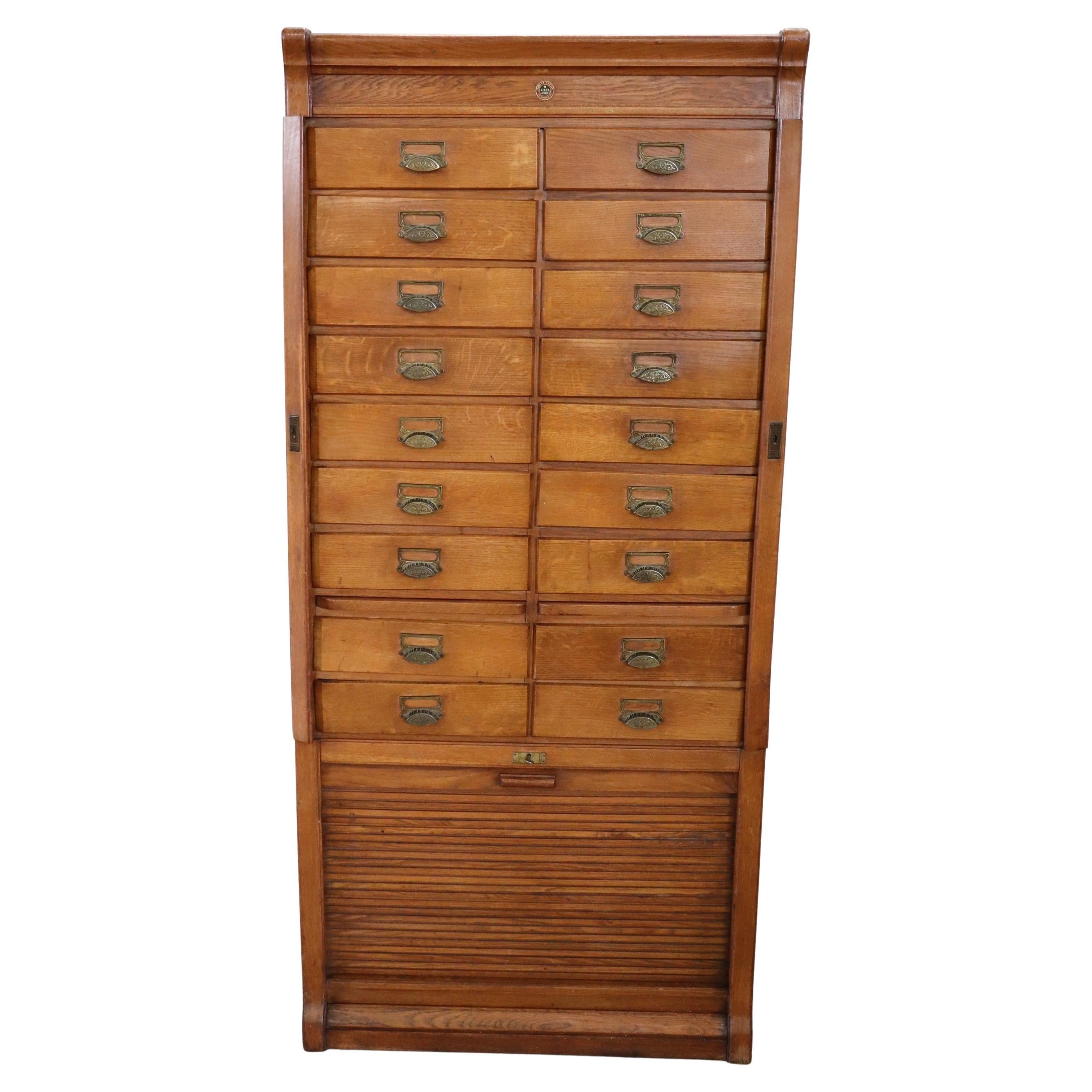 Italian 1920s Oak Wood Apothecary / Filing Cabinet, 18 Drawers and Shutter door For Sale