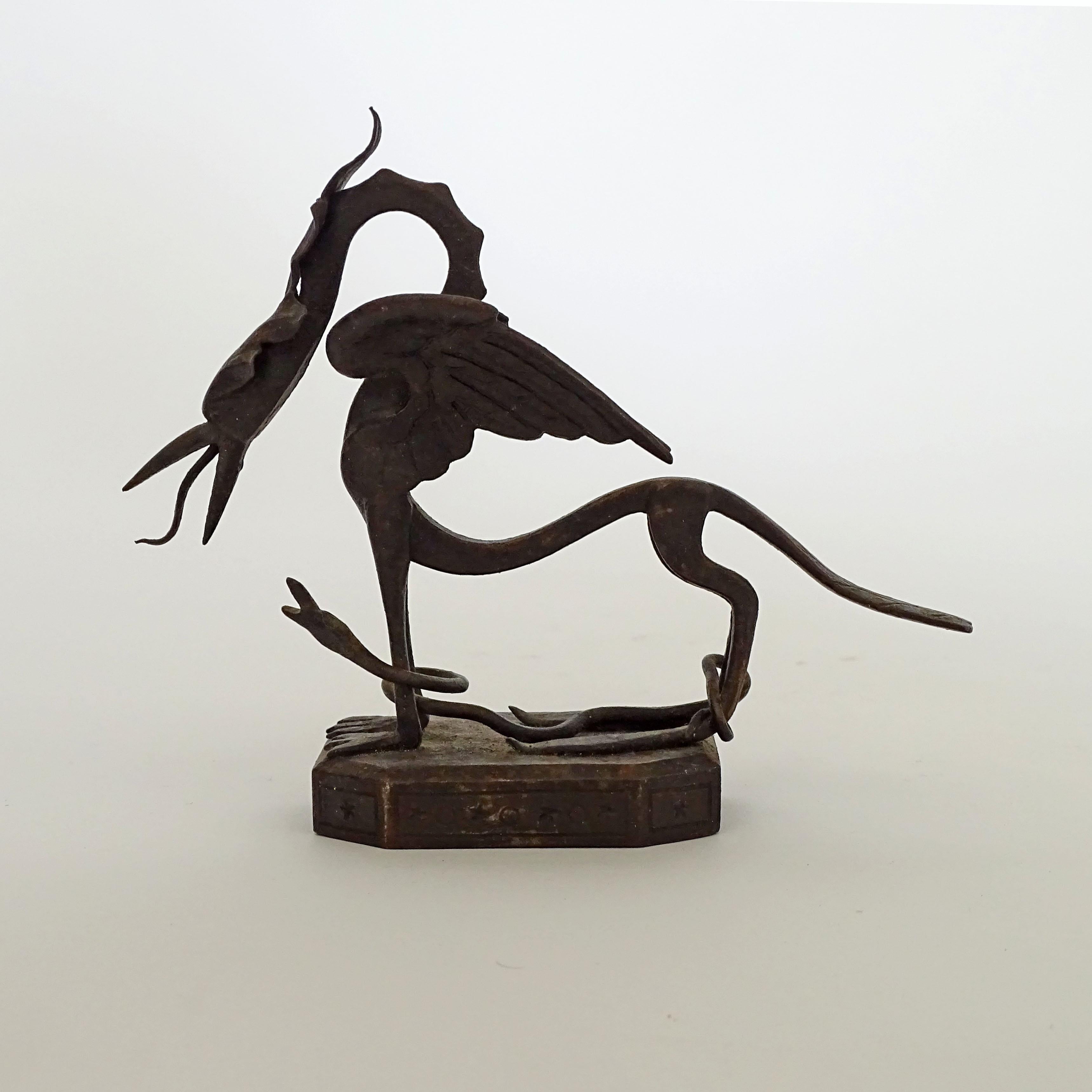 Splendid Italian 1920s wrought iron dragon and snake paperweight.