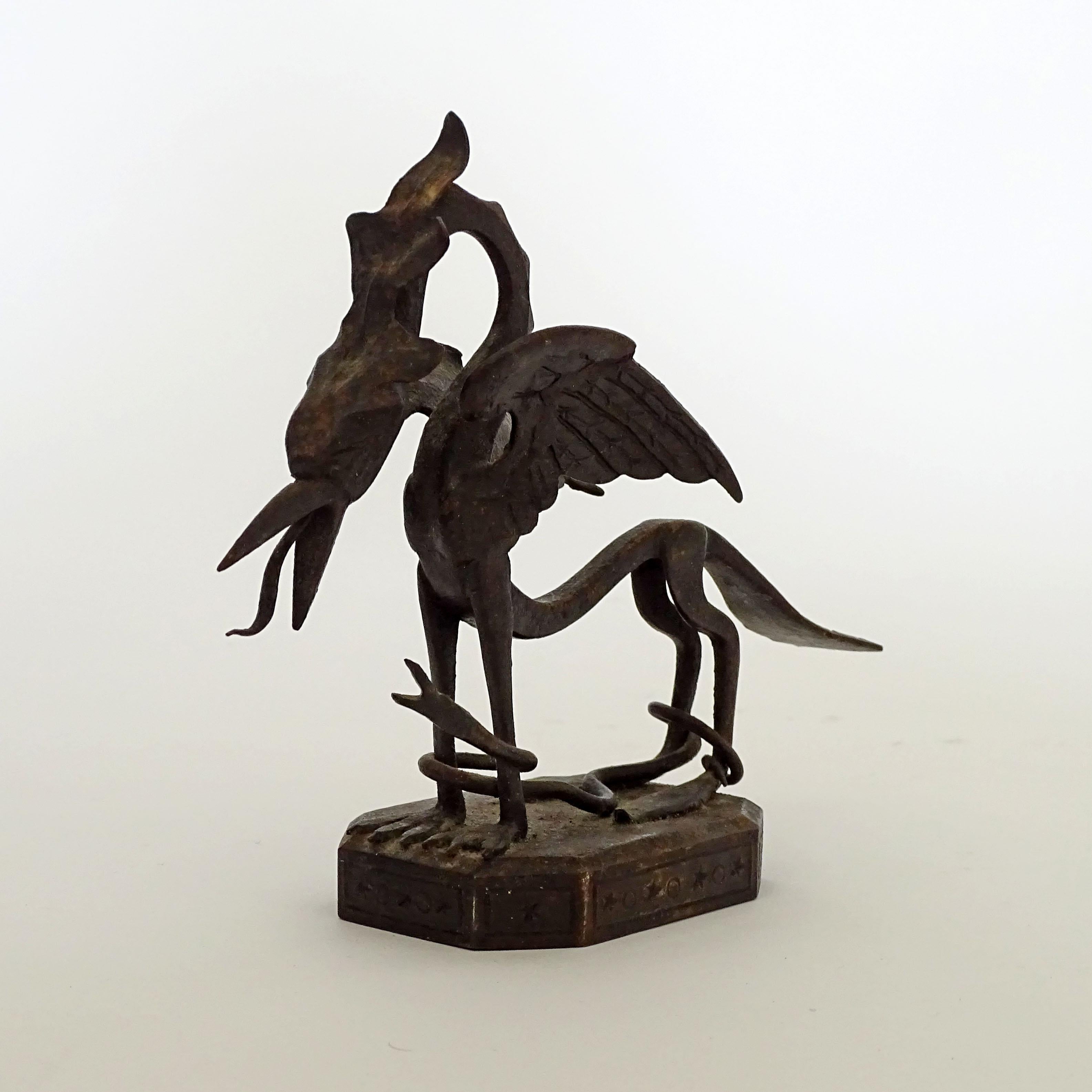 Mid-Century Modern Italian 1920s wrought iron dragon and snake paperweight For Sale