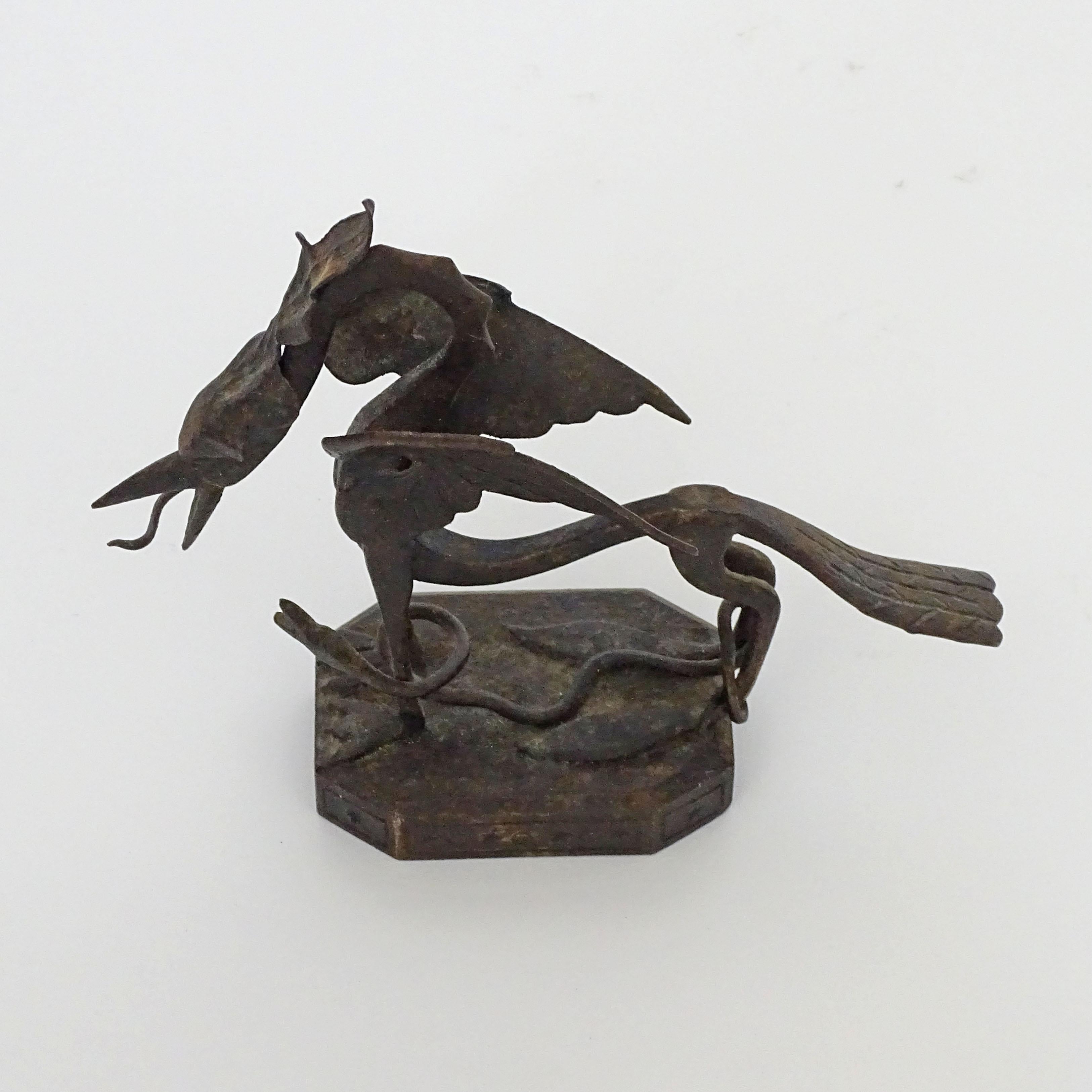Early 20th Century Italian 1920s wrought iron dragon and snake paperweight For Sale