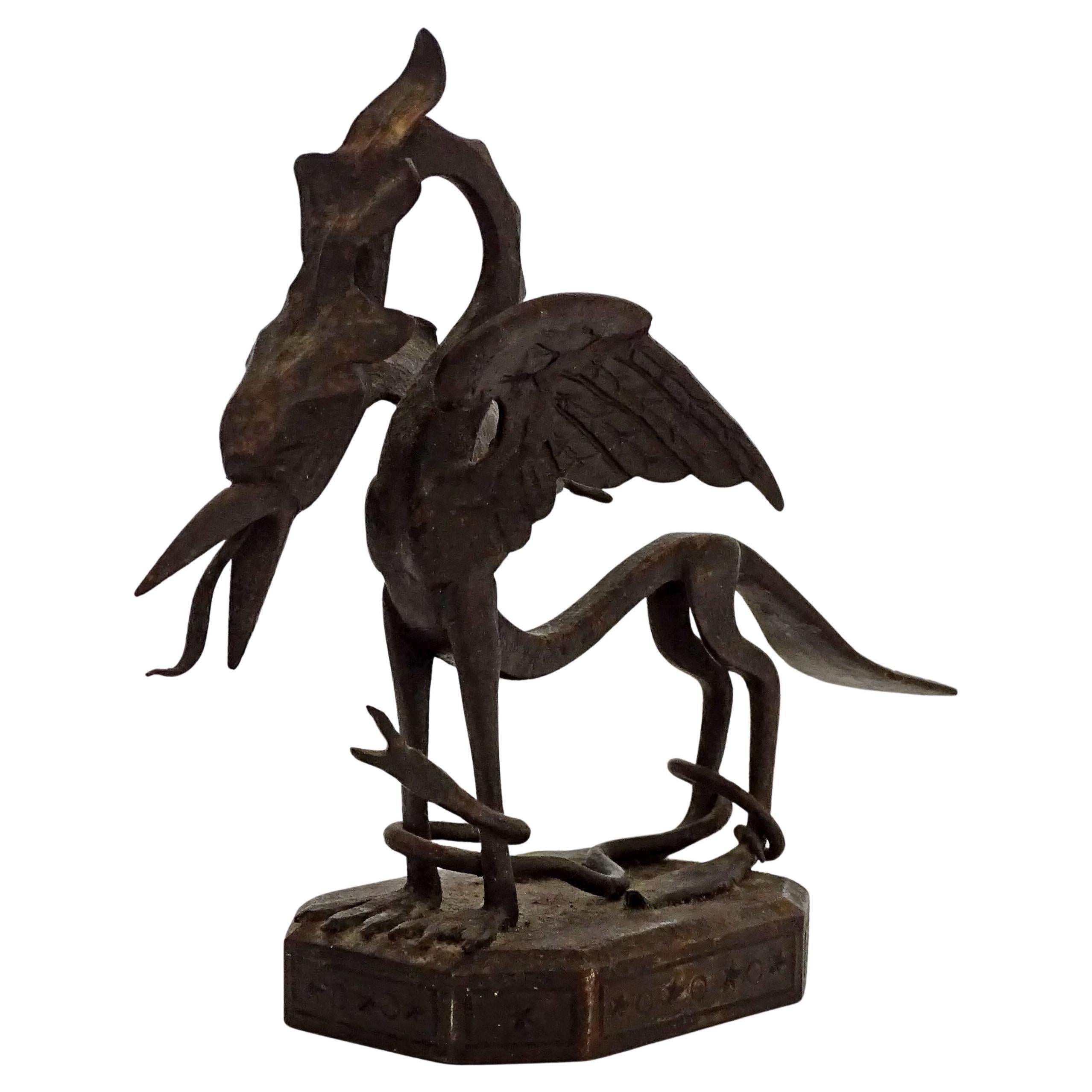 Presse-papier en fer forgé italien des années 1920 avec dragon et serpent