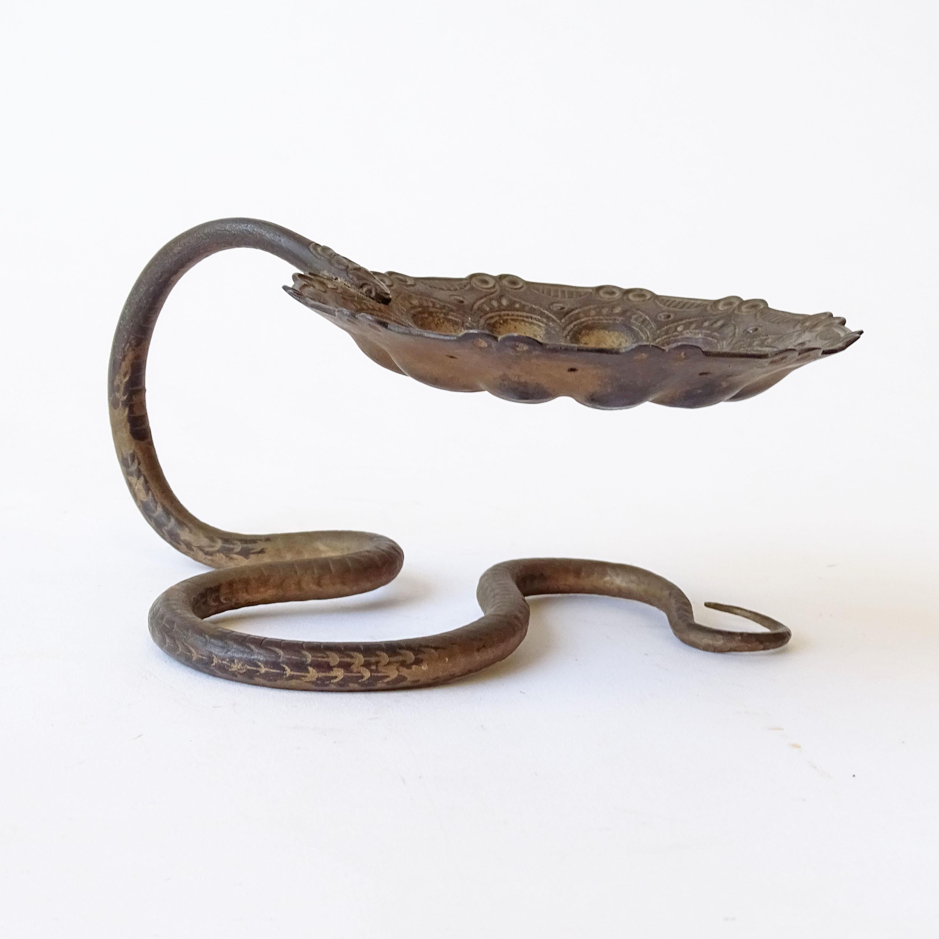 Italian 1920s Wrought Iron Finely Engraved Snake and Dish Vide-Poche.
Originally was probably painted in gold paint.
