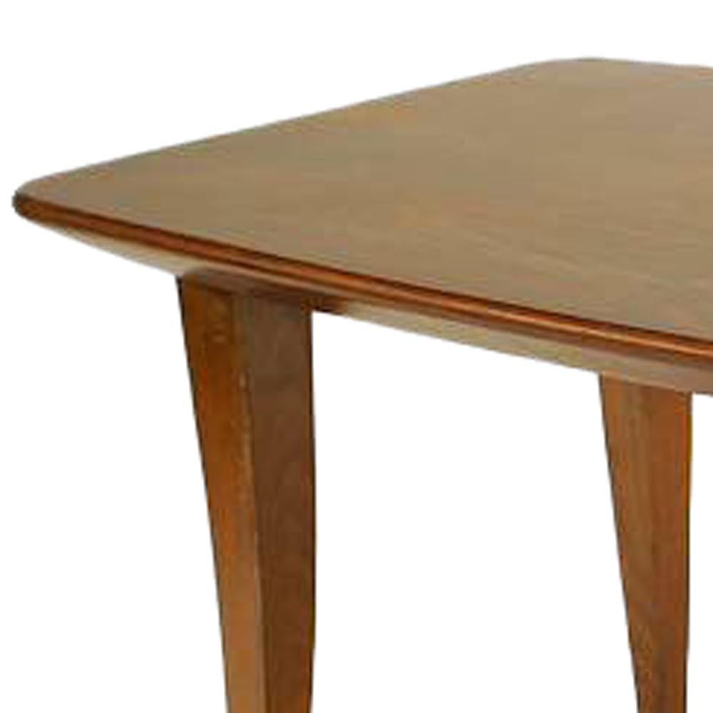 Table basse rectangulaire en noyer de l'école rationaliste italienne du milieu du siècle dernier (années 1930) avec des pieds effilés et évasés.

Condition antique.
 
