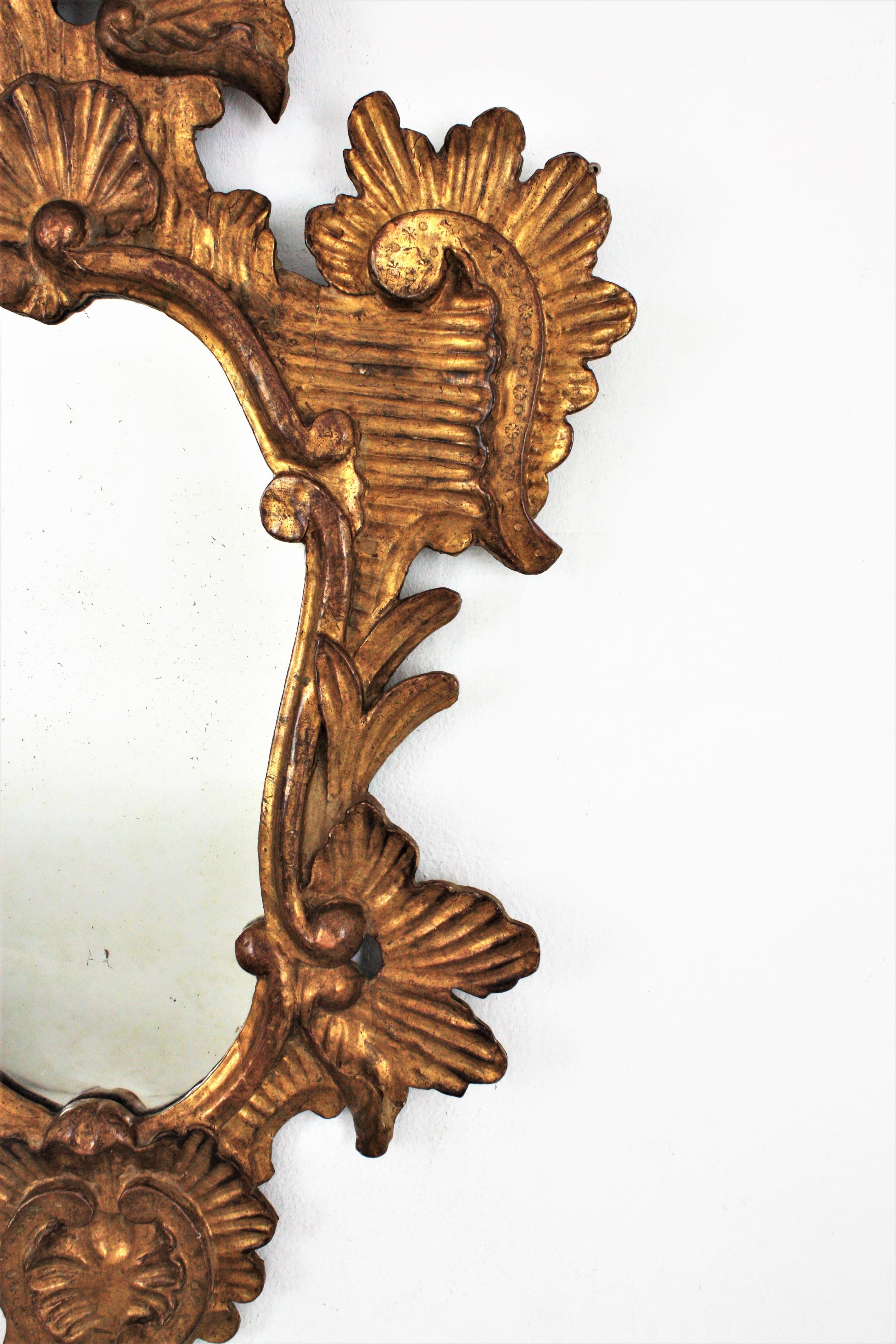 20ième siècle Miroir italien rococo en bois doré en vente