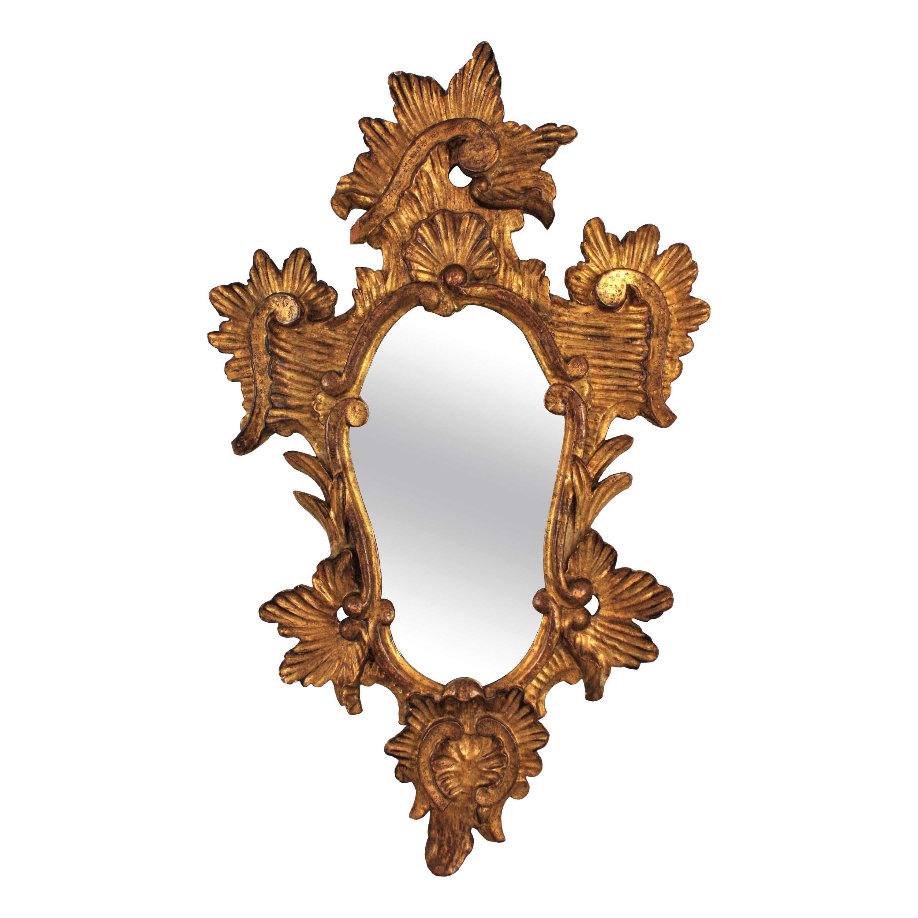 Miroir italien rococo en bois doré