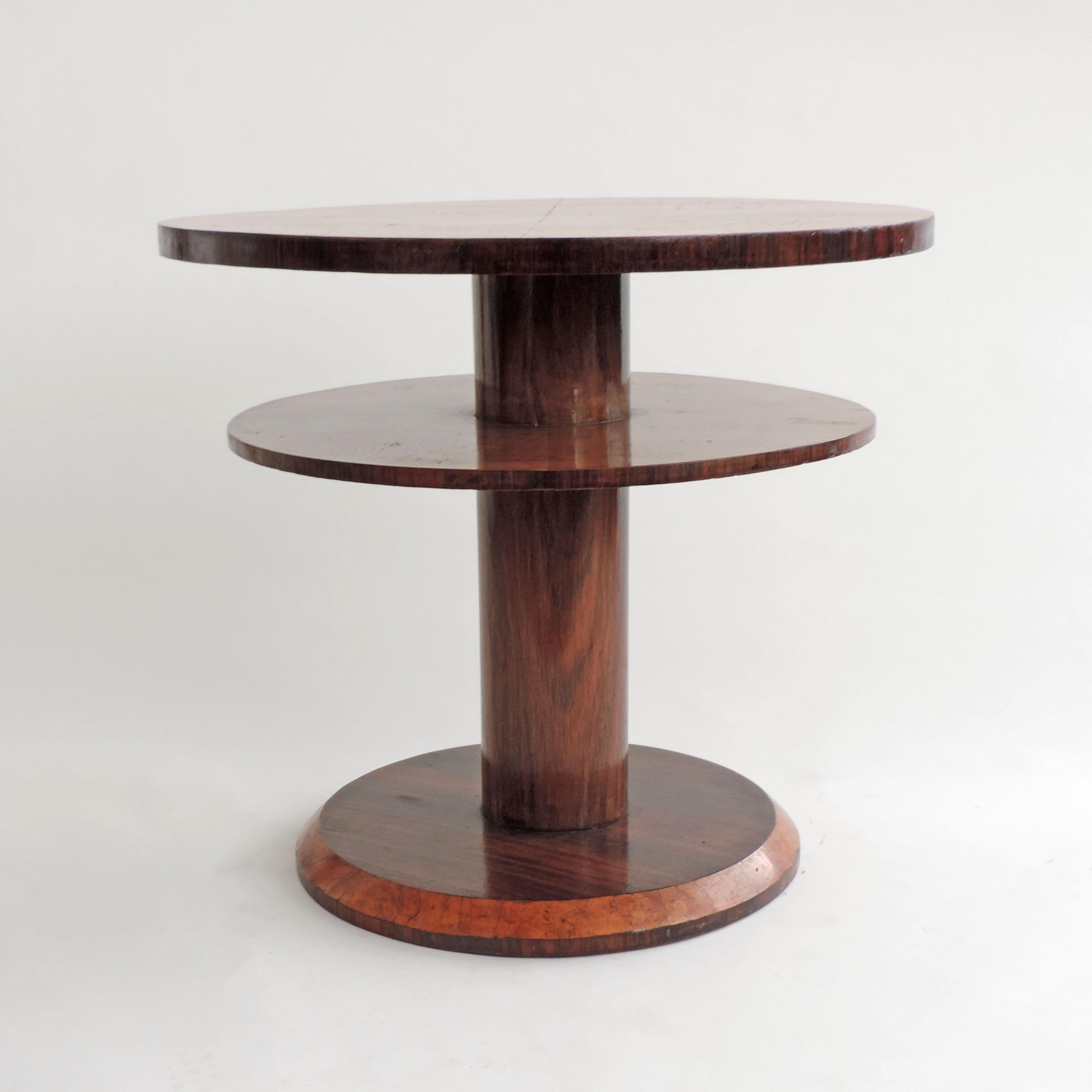 Italian 1930s Art Deco Two-Tier Round Wooden Coffee Table
Attributed to architect Gio Ponti work for Domus Nova at La Rinascente, Milano
A similar table was designed at the same period in glass and metal for Fontana Arte.
 