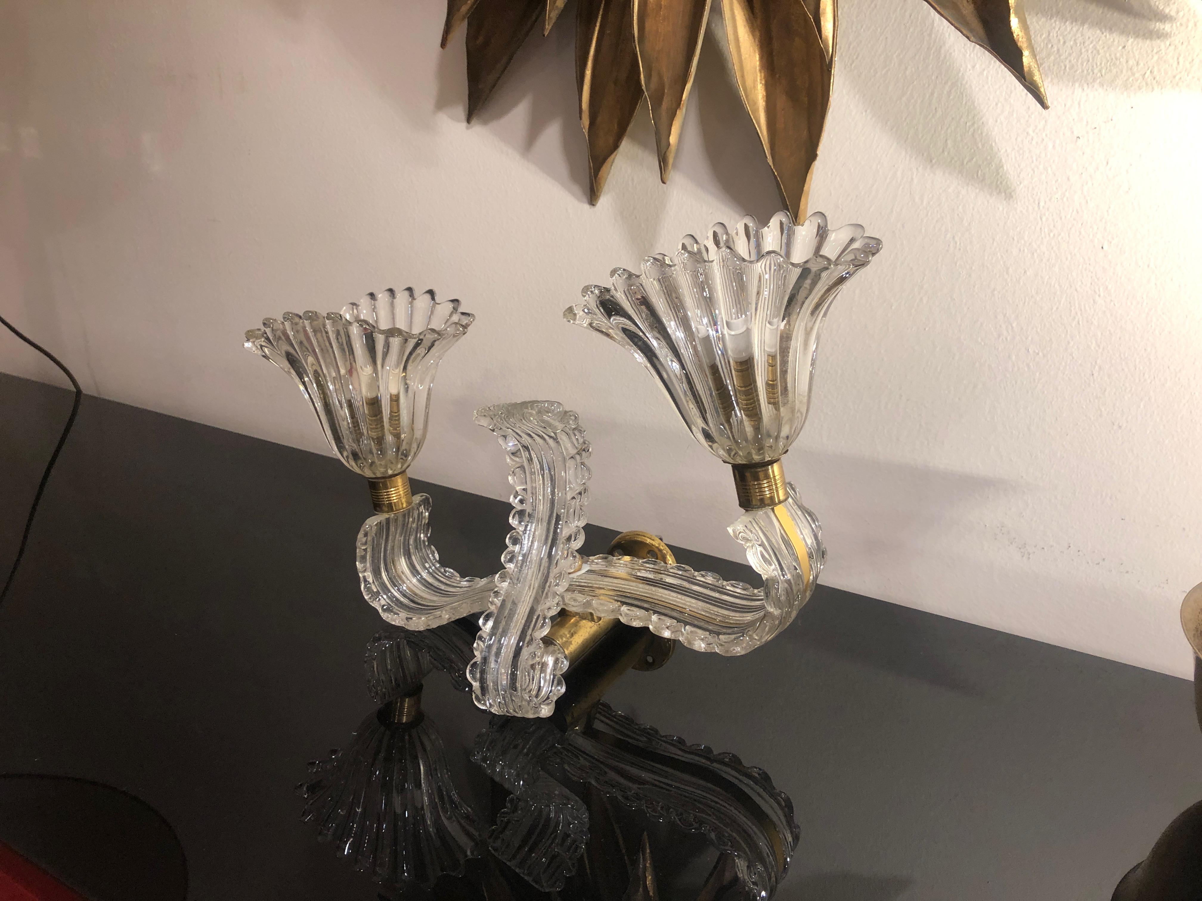 1940s glass and brass Barovier style double light wall sconce
Rewired, ready to be hang. 
No structural damages, no cracks, the brass shows the original patina with wears coherent with age.
Dimensions: W 40 CM, H 30 CM, D 20 CM
A video is available