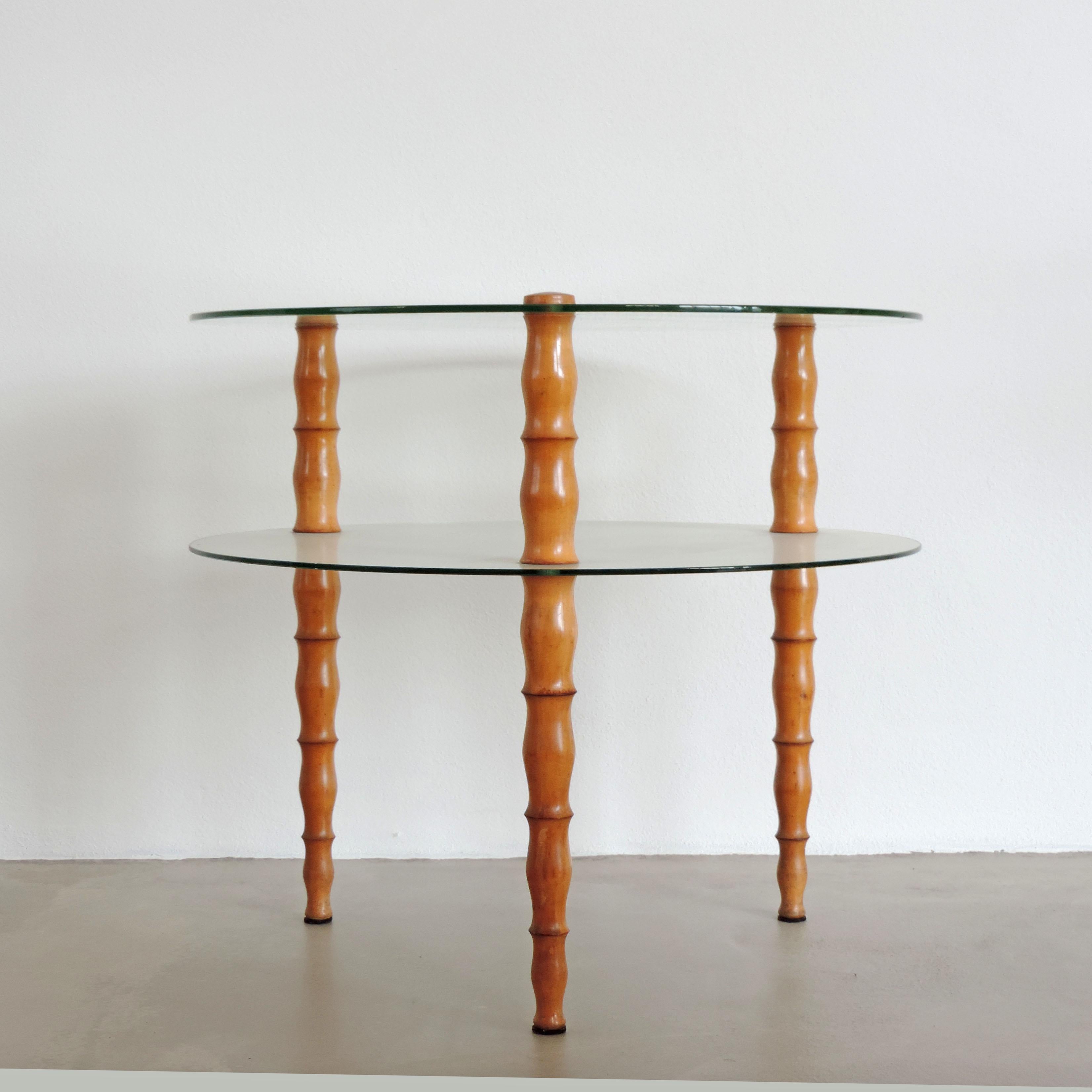 Italian 1940s circular two tier glass and turned wood coffee table.
