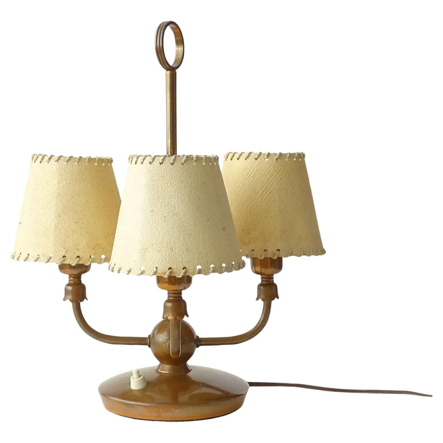 Quattro luci italiane degli anni '40  Lampada da tavolo in rame