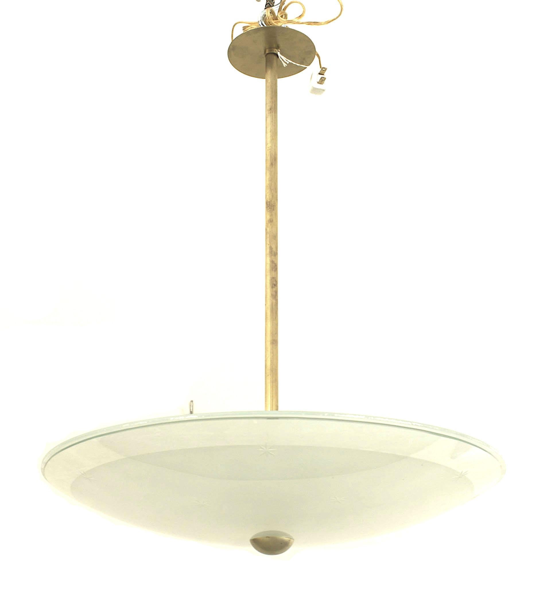 Italian Mid-Century (1940s) large frosted glass circular shade with a border and etched stars suspended by a fluted brass center post with a flat finial bottom. (BRUSSOTI)
