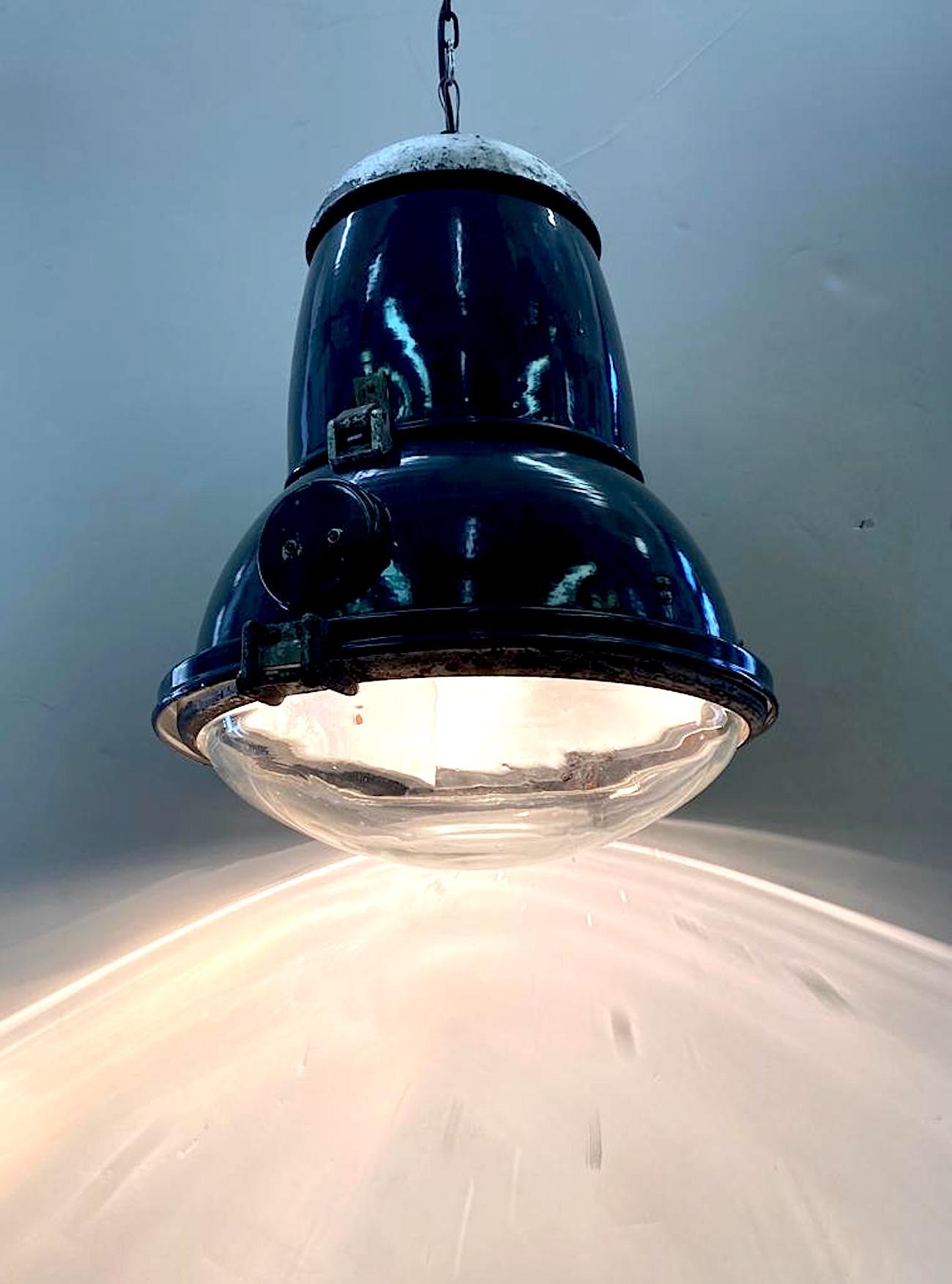 A very large Italian industrial lantern from a warehouse or factory from the 1940s-1950s. It is in a rare heavy blue enamel color on iron. The top piece is painted a silver color paint on iron. The lantern is comprised for three main pieces, a