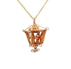 Italian 1950 Lamp Charm for Bracelet in 14 Karat Yellow Gold with Red Garnets