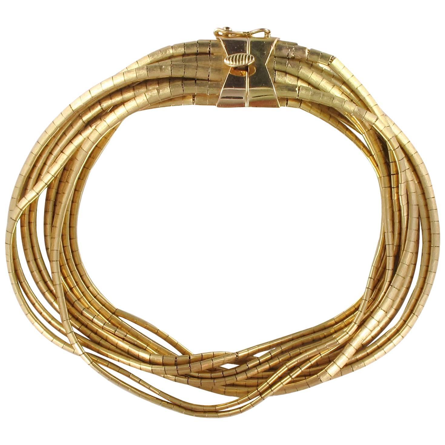 Italian 1950s 18 Karats Yellow Satin Gold Ribbons Bracelet