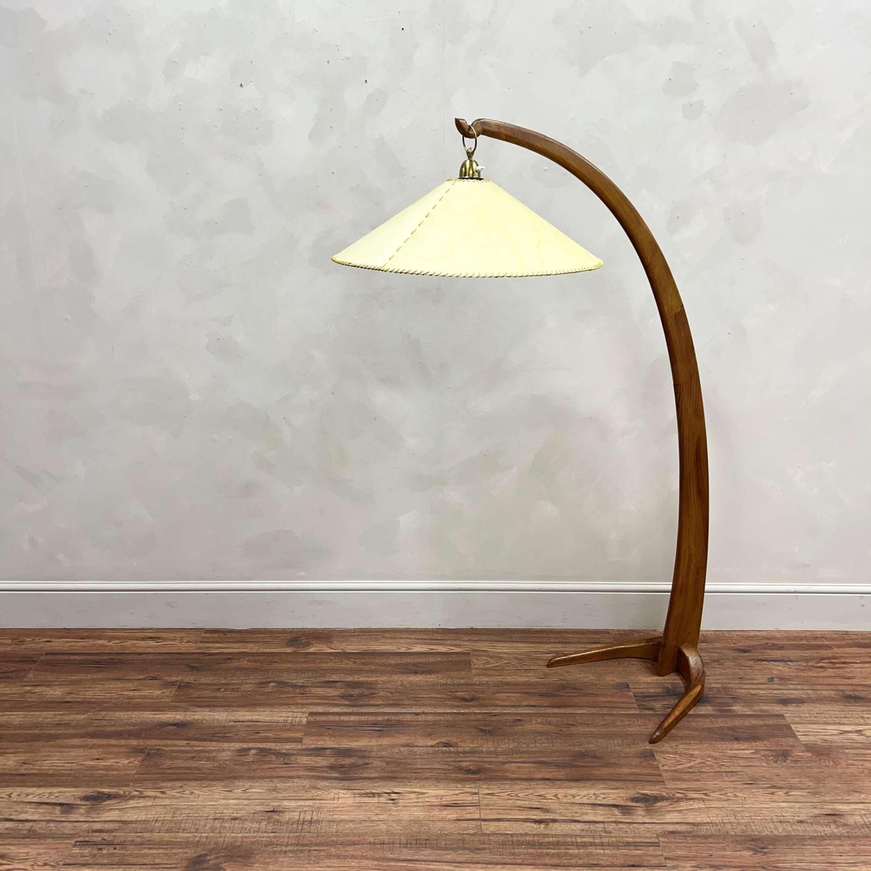 A very stylish mid century Italian arched floor lamp, made from beech with its original hand stitched shade.
This will be wired and PAT tested with a choice of coloured flex.

Italy, circa 1950.

Height - 162.5 cm
Arm Depth - 97 cm
Shade Diameter -