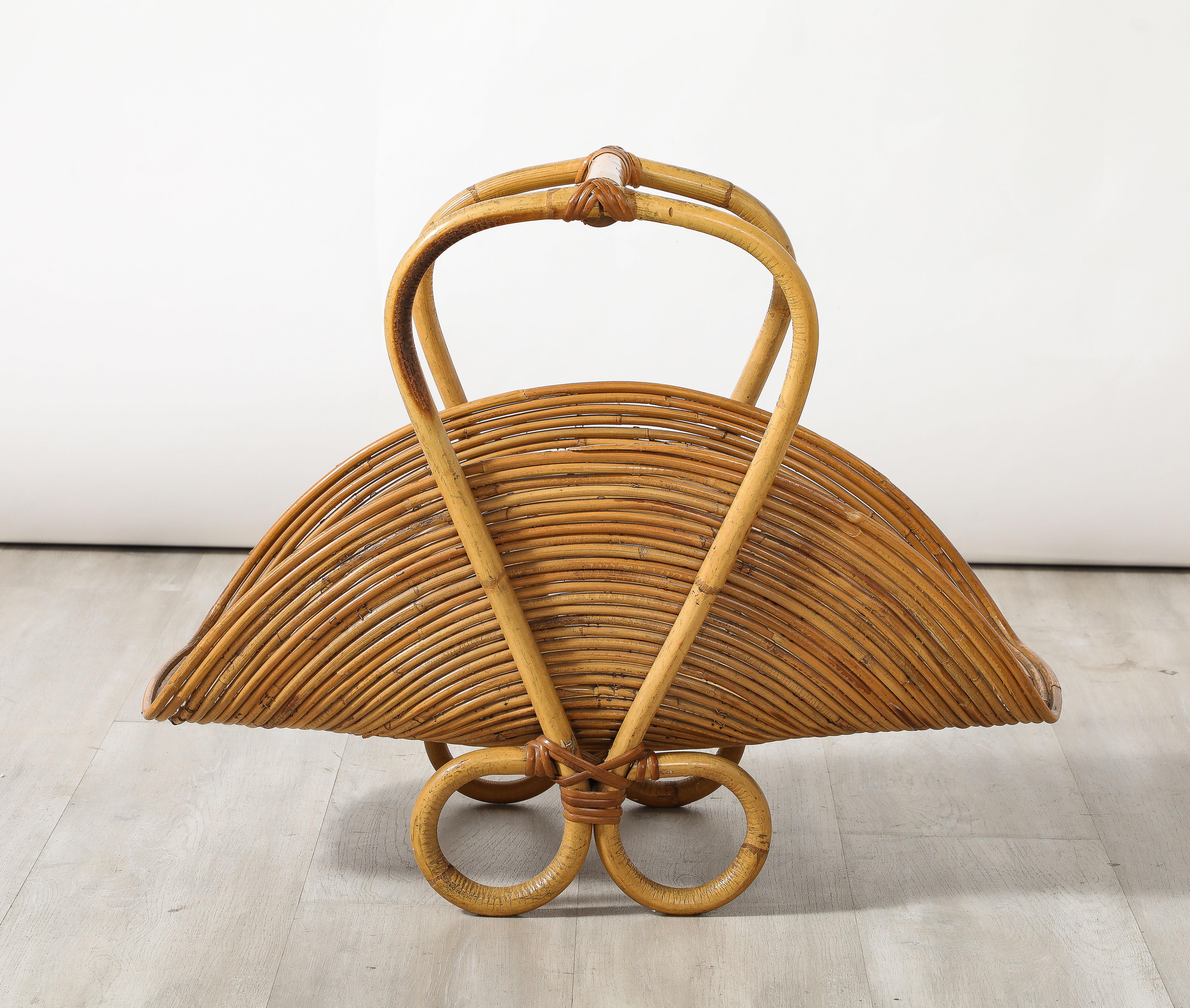 A charming and whimsical Italian 1950's bamboo basket, large and with wonderful design. 
Italy, circa 1950 
Size: 19 3/4