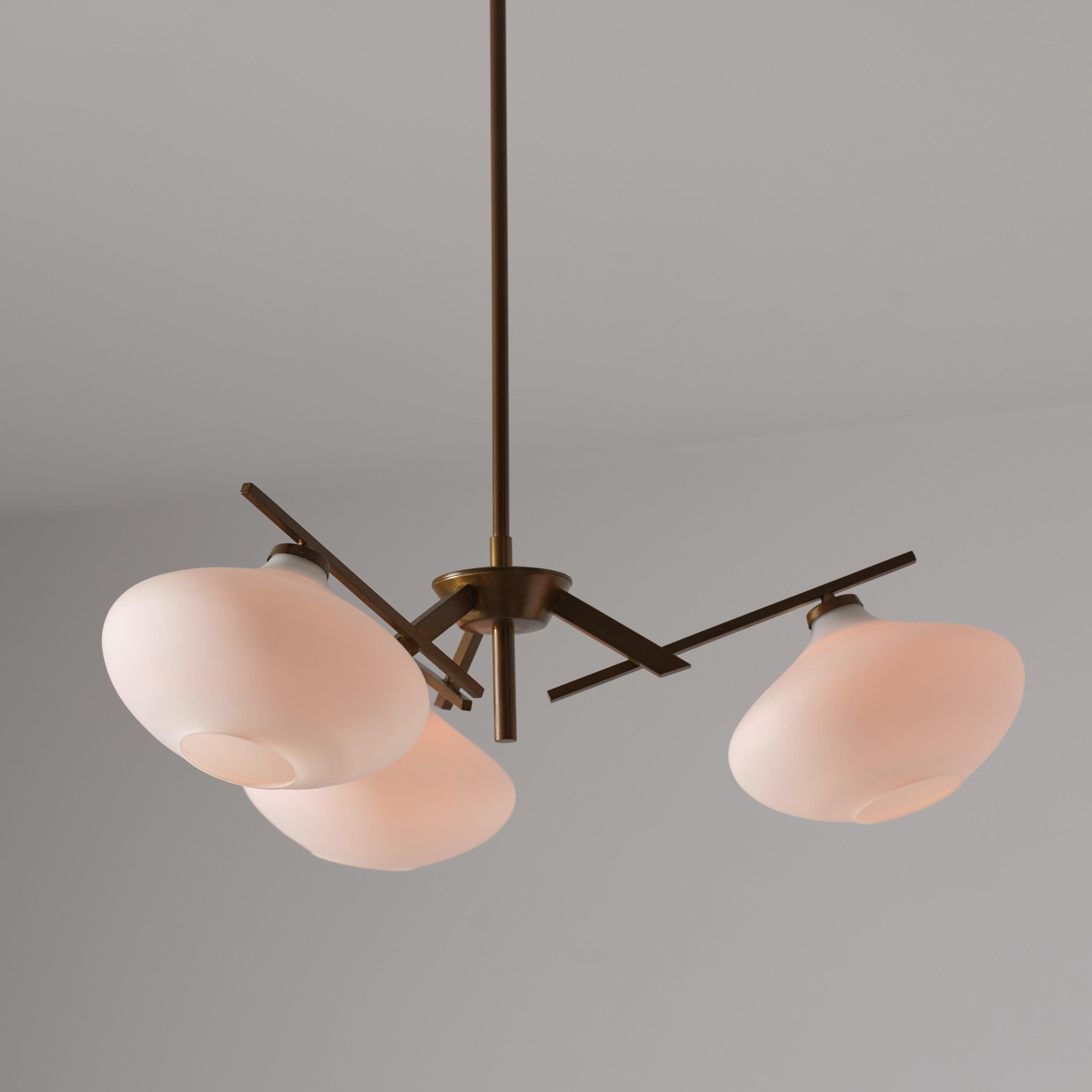 Italian 1950s Brass Chandelier with Three Opaline Glass Shades In Good Condition For Sale In Rome, IT