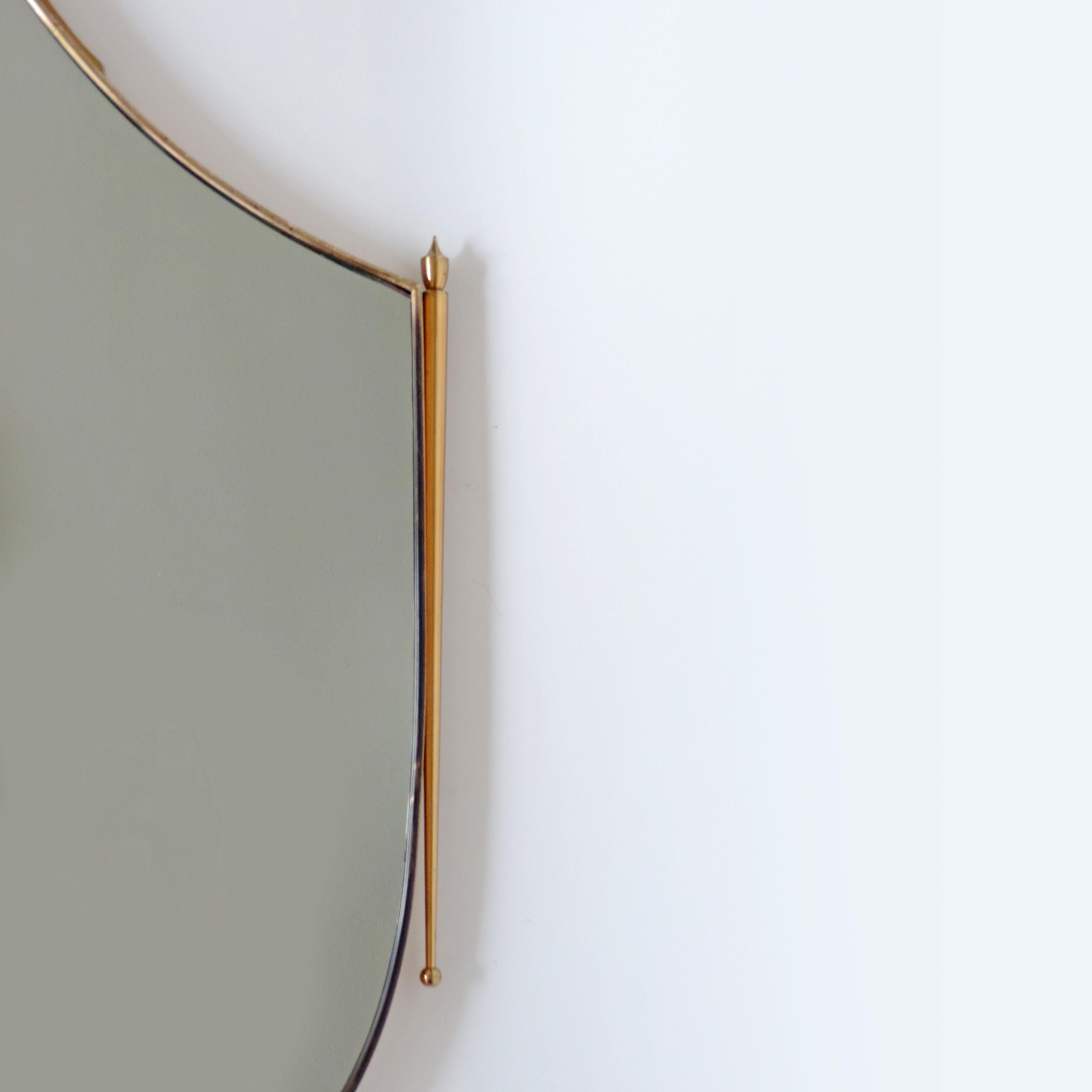 Italian 1950s brass wall mirror.