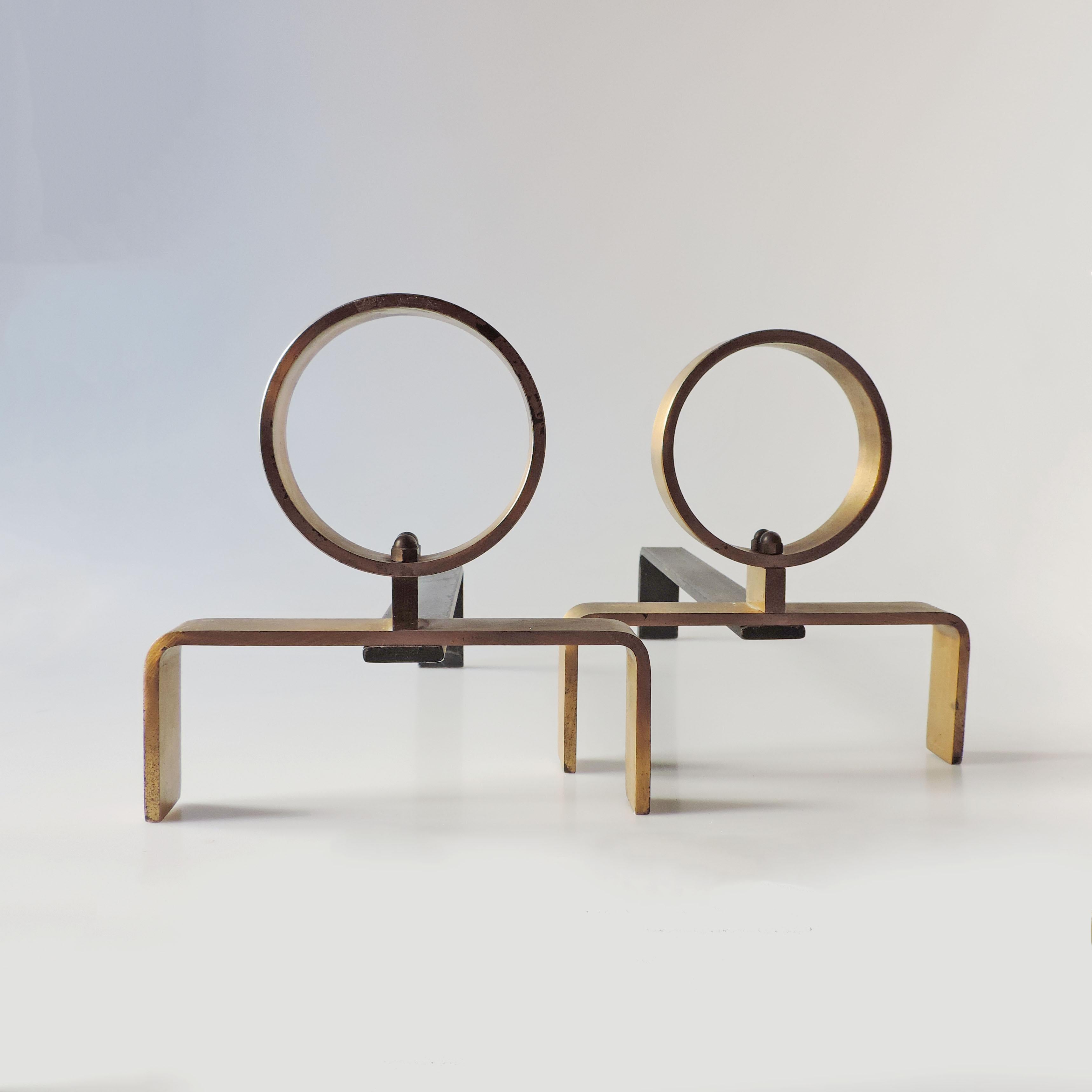 Italian 1950s fireplace andirons in brass and iron.
Attributed to Melchiorre Bega.
Never used.