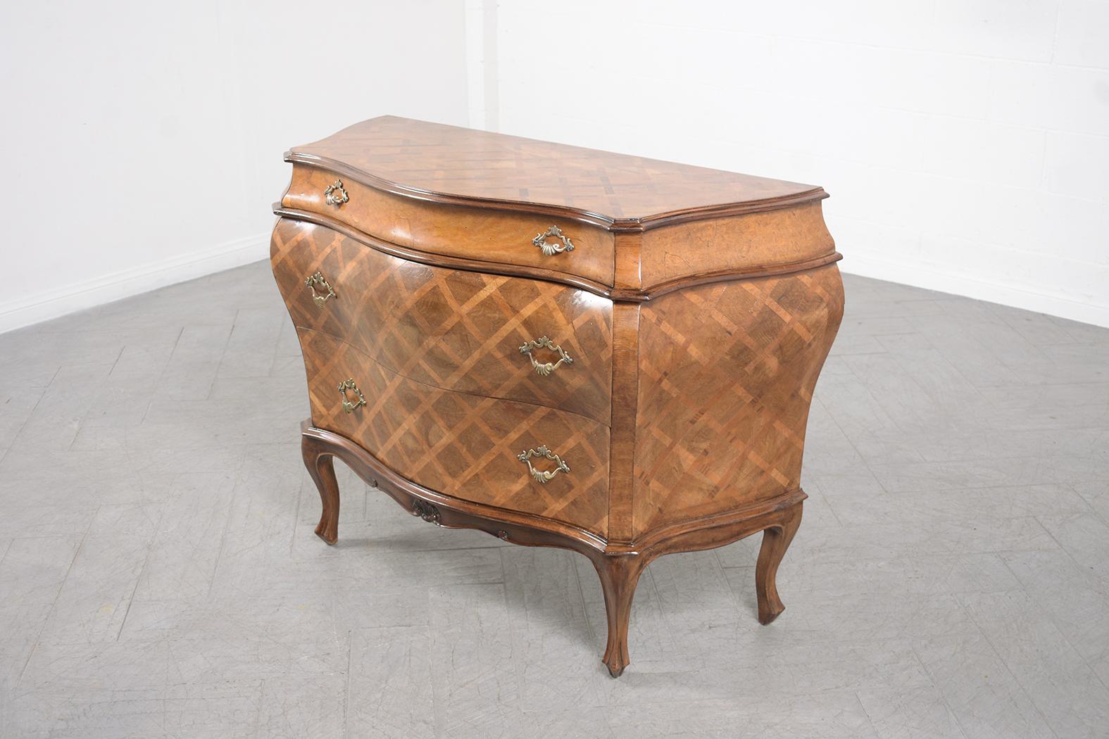 Elevate your interiors with our beautifully restored Italian Vintage Commode – a piece that seamlessly merges craftsmanship and elegance. Meticulously crafted from high-quality wood and enriched with detailed marquetry veneers, this Bombay chest