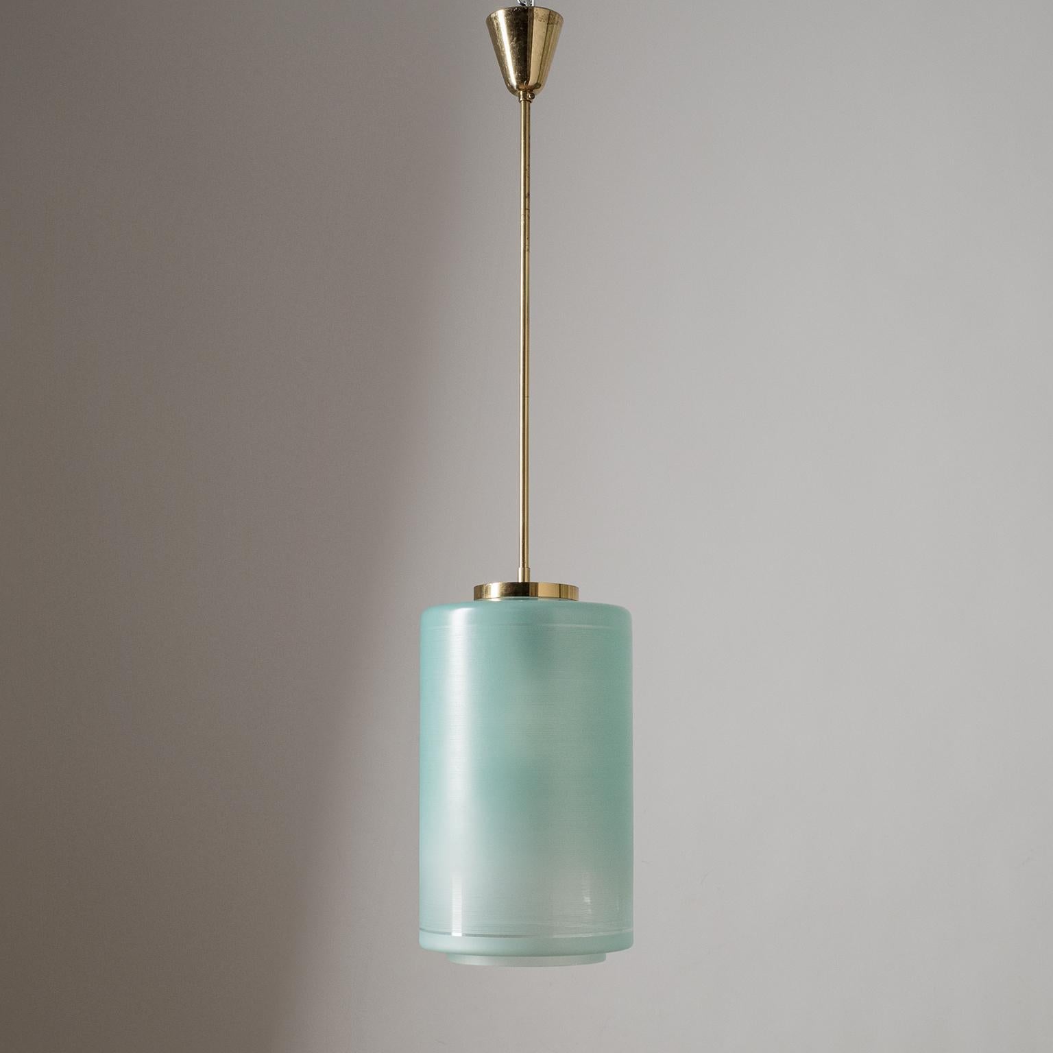Italian pendant/lantern, circa 1960, with a large glass diffuser, enameled in aquamarine or turquoise pinstripes. One original brass and ceramic E27 socket with new wiring. Height without the stem is 14.5inches/37cm.
