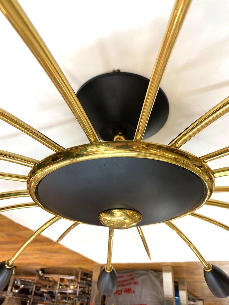 Italian 1950s Large Brass & Black Enamel Star-Burst Ceiling Mount Light In Good Condition In Montclair, NY