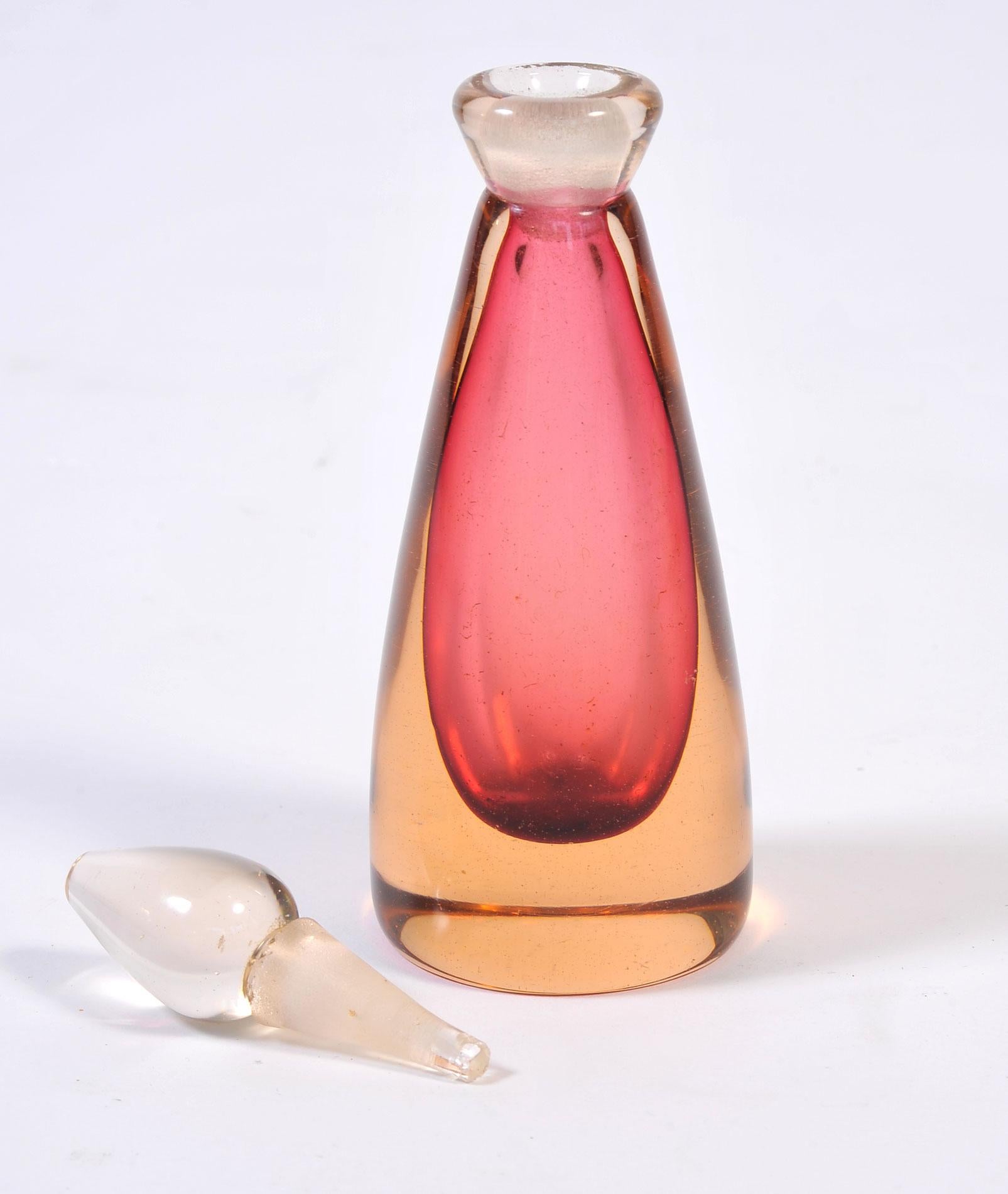 Romantic shaded rose pink and palest amber Murano glass perfume bottle by Seguso. Complimented with a tear drop stopper.
