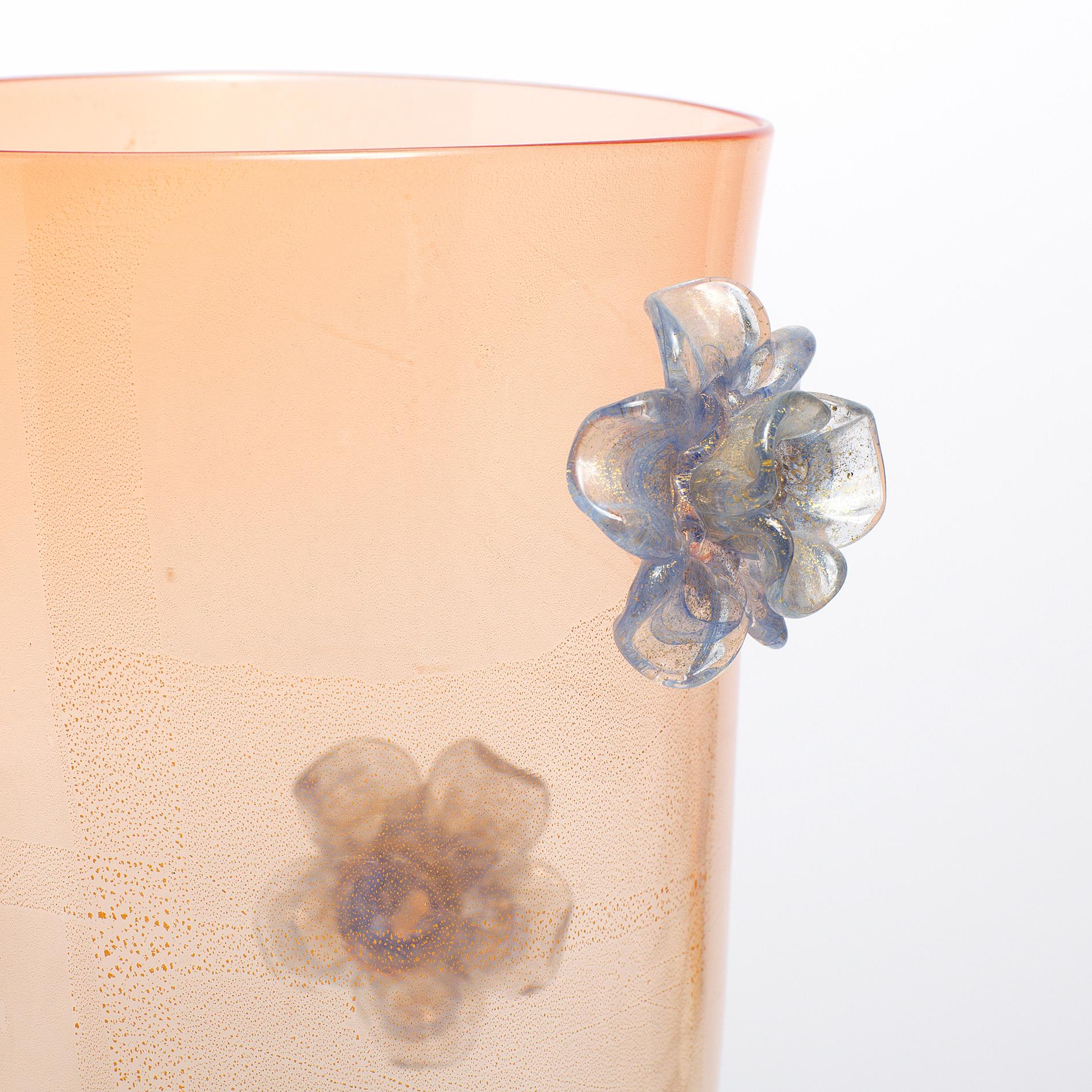 Stunning tall midcentury vase in soft peach opaque glass dotted with three impressive and intricate blue glass flowers. Equally stunning either with or without flowers.