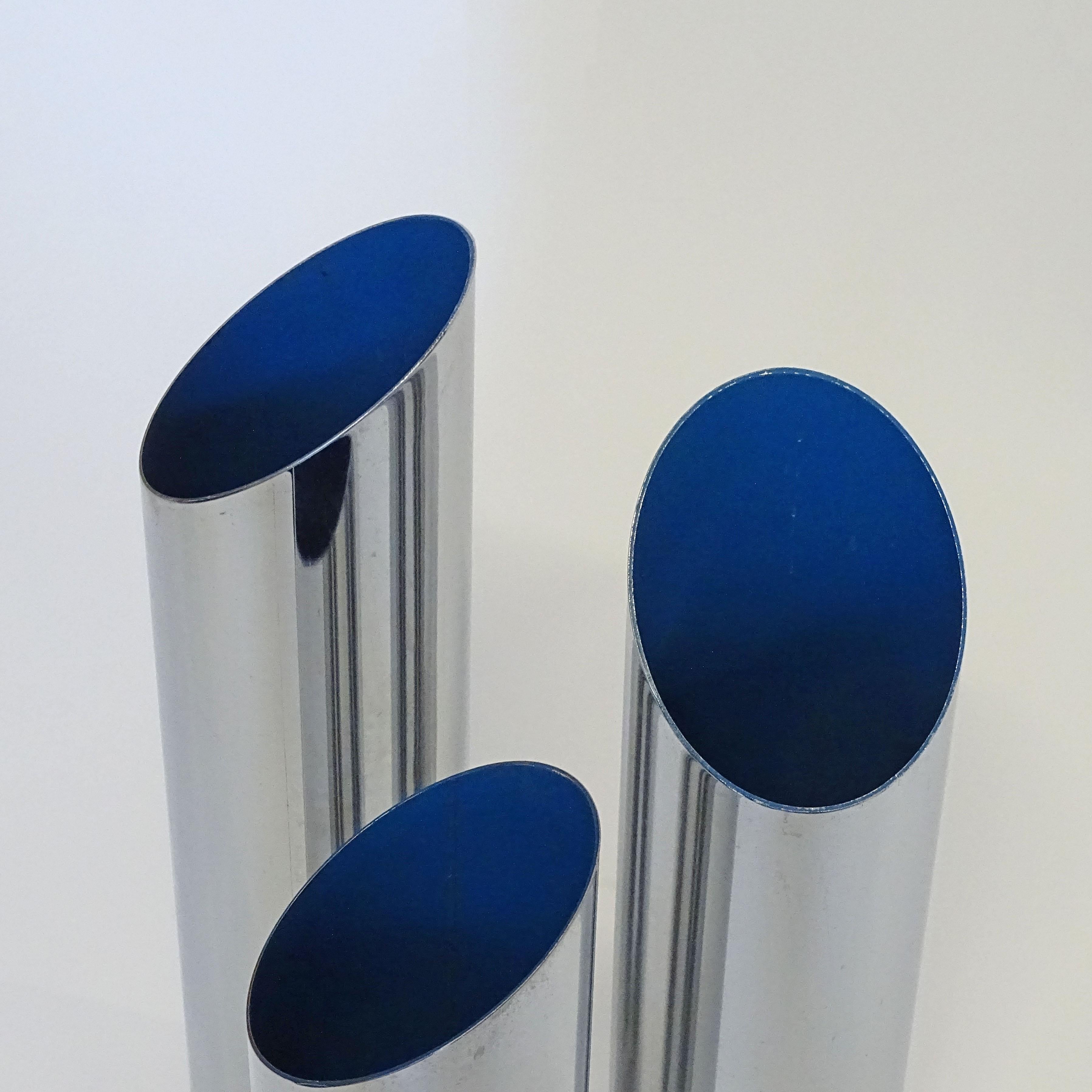 A splendid Italian 1950s set of three diagonally cut umbrella stand in Chrome and Electric Blue paint used together to make a single umbrella Stand.
