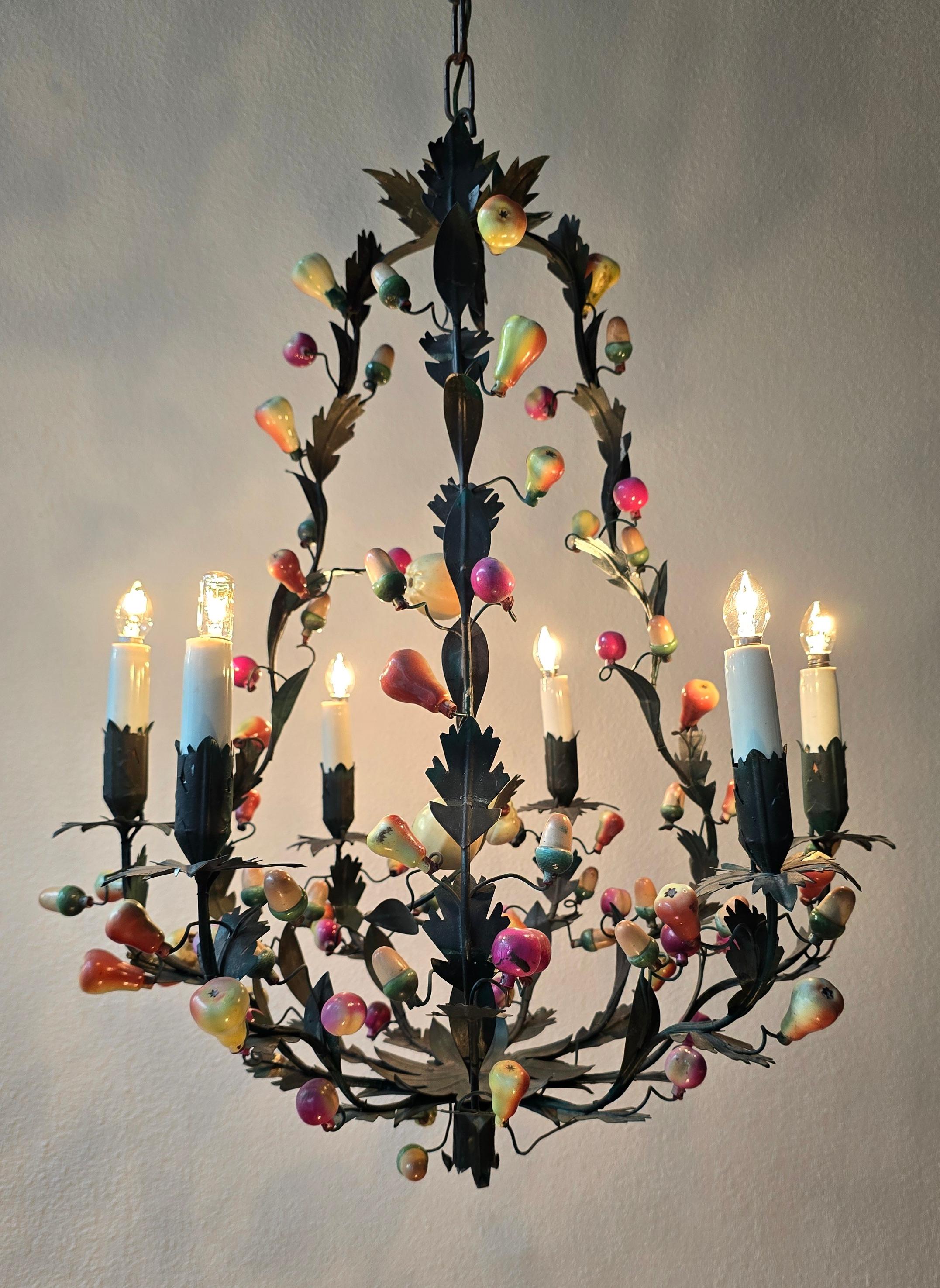 Exceptionally rare Italian 1950s tole chandelier with colorful pressed fruit decorations — a playful and poetic example of mid-century Florentine craftsmanship.

A stunning Italian hand-painted tole chandelier from the 1950s, richly decorated with