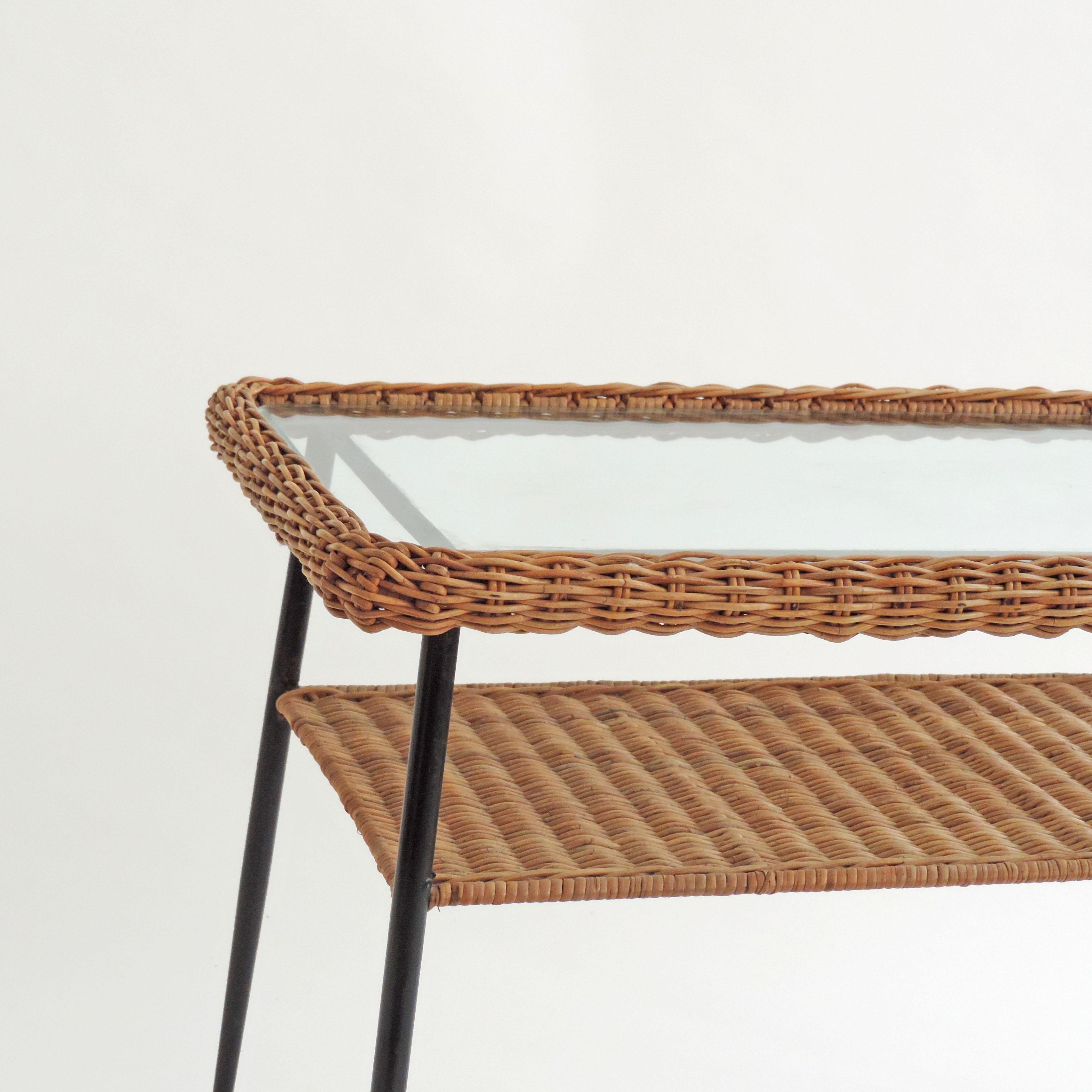 Italian 1950s Wicker and metal two tiered coffee table.
 