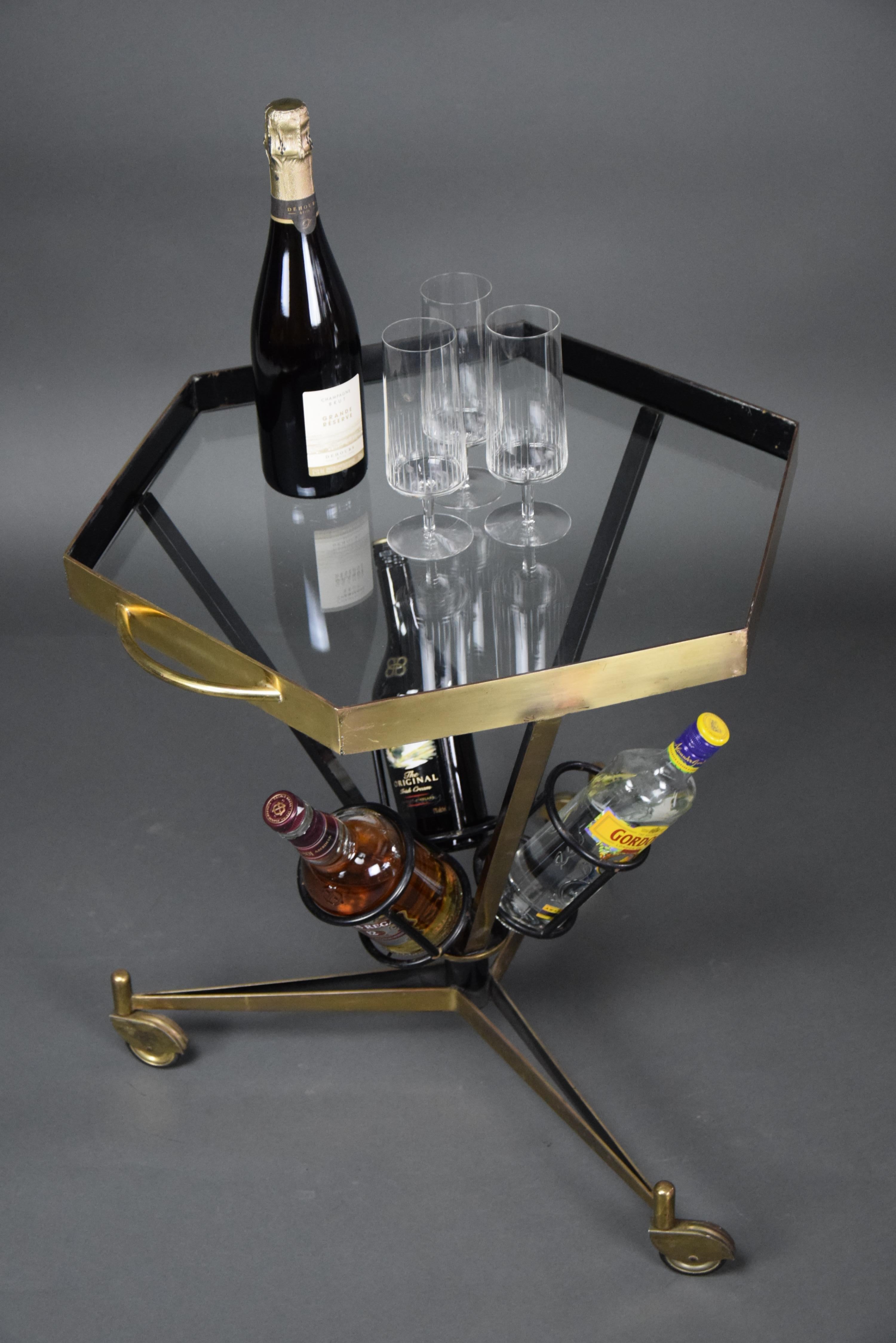 Stylish, classy and elegant Italian Mid-Century Modern brass and glass bar trolley.

The trolley will be shipped overseas in a custom made wooden crate. Cost of transport to the US is crate included.

Italy is a world trendsetter, and has produced