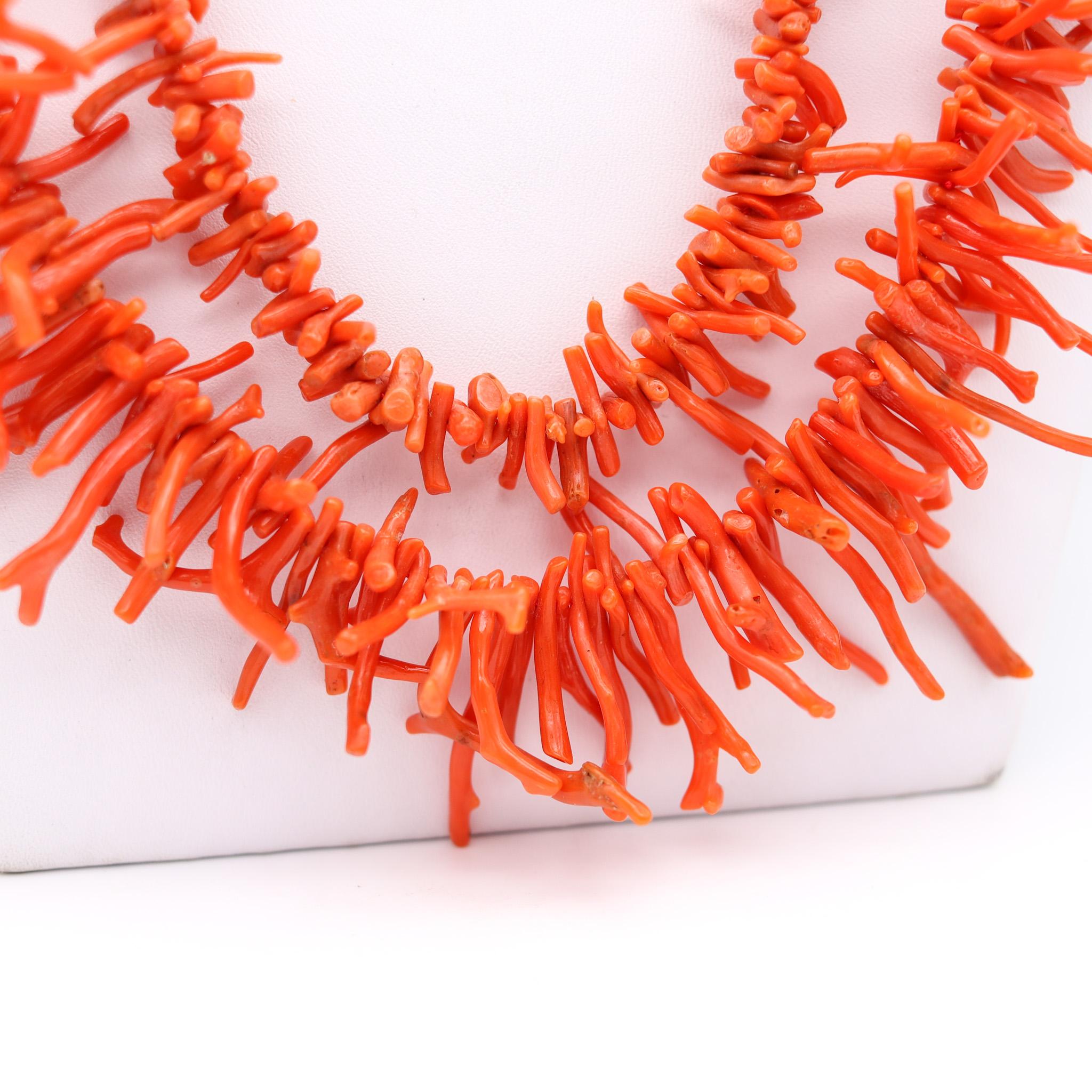 Double strands Graduated Roots Coral necklace.

Gorgeous colorful necklace created in the coastal city of Napoles Italy back in the 1960. This fabulous necklace is composed by two graduated strands of natural Neapolitan roots coral with a total