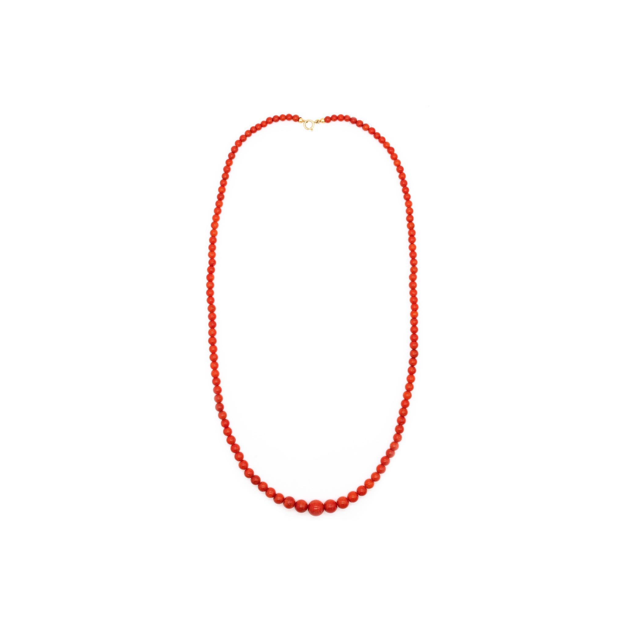 A necklace with Italian Sardinian Red Coral.

Delicate and elegant piece, made in Italy, circa 1960. It is composed by 121 graduated round spherical beads (4 to 9 mm) carved from natural Sardinian red coral and a 18 kt yellow gold crab lock.

The