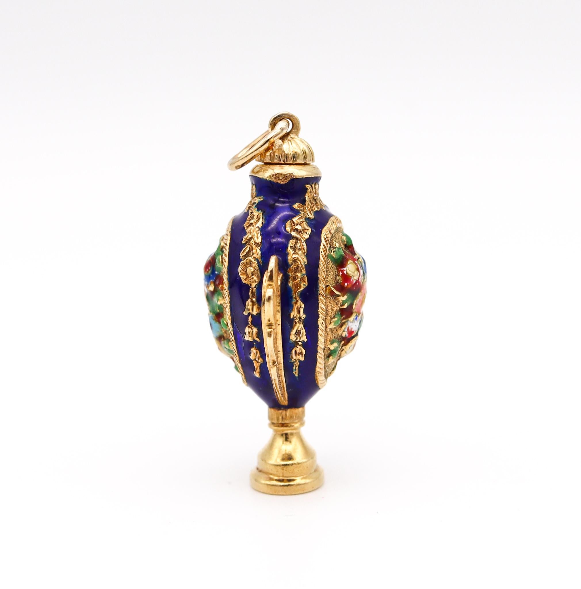 Enameled pendant scent perfume amphora bottle.

Gorgeous vintage piece, created in Venice Italy during the mid century period, back in the 1960. This beautiful three-dimensional pendant perfume bottle has been crafted in the shape of an amphora in 