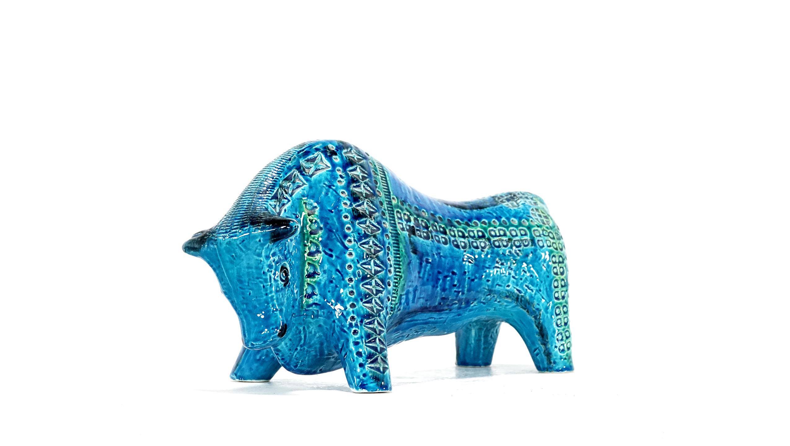This iconic Rimini Blu Bull ceramic was manufactured, circa 1960. It is one of the quite rare big animal models and has an amazing green blue glaze. Aldo Londi was born in Montelupo near Firenze where he grew up in a big ceramic tradition. In the
