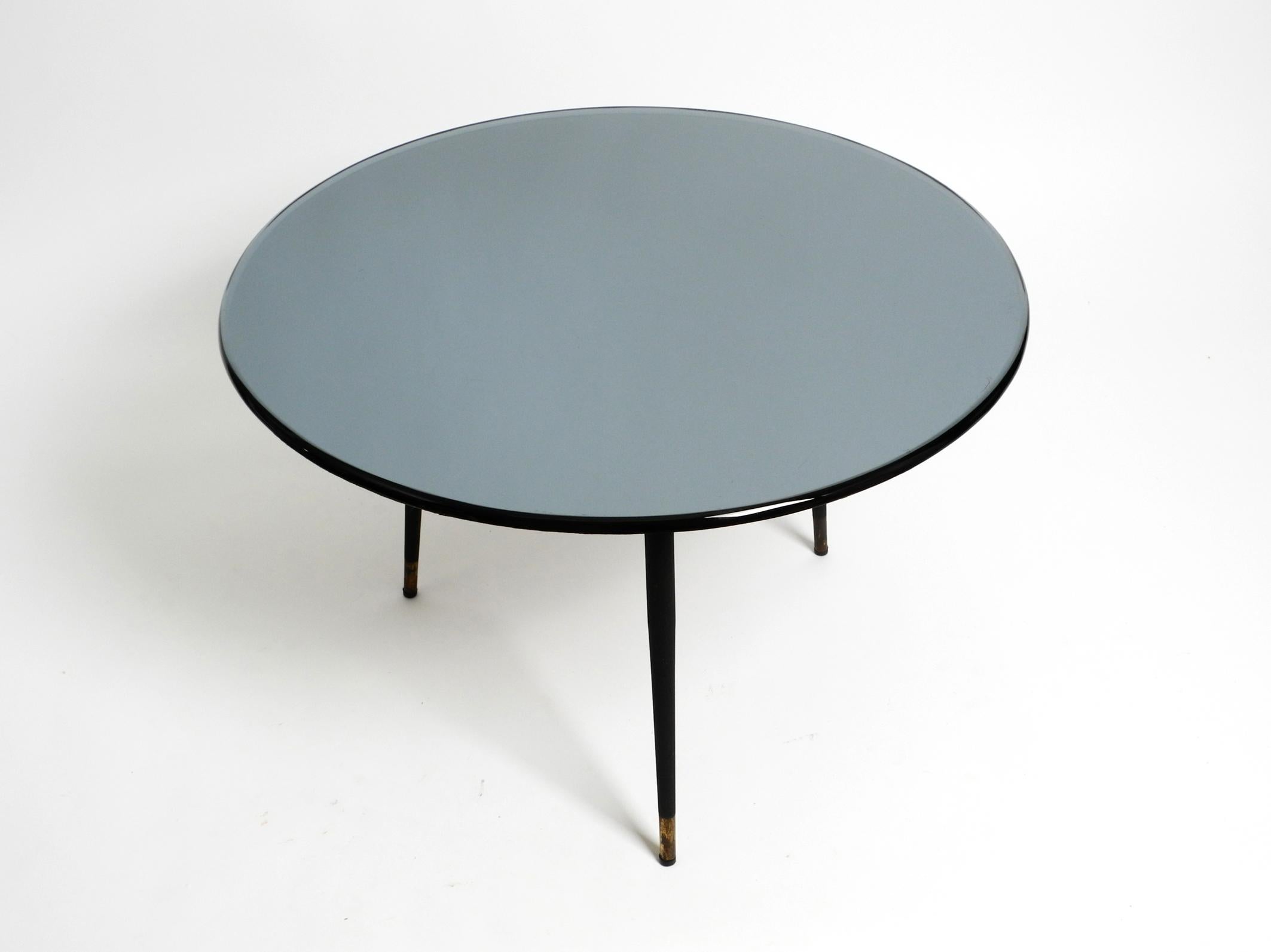 Italian 1960s blue gray round mirrored glass side table with metal tripod base For Sale 13